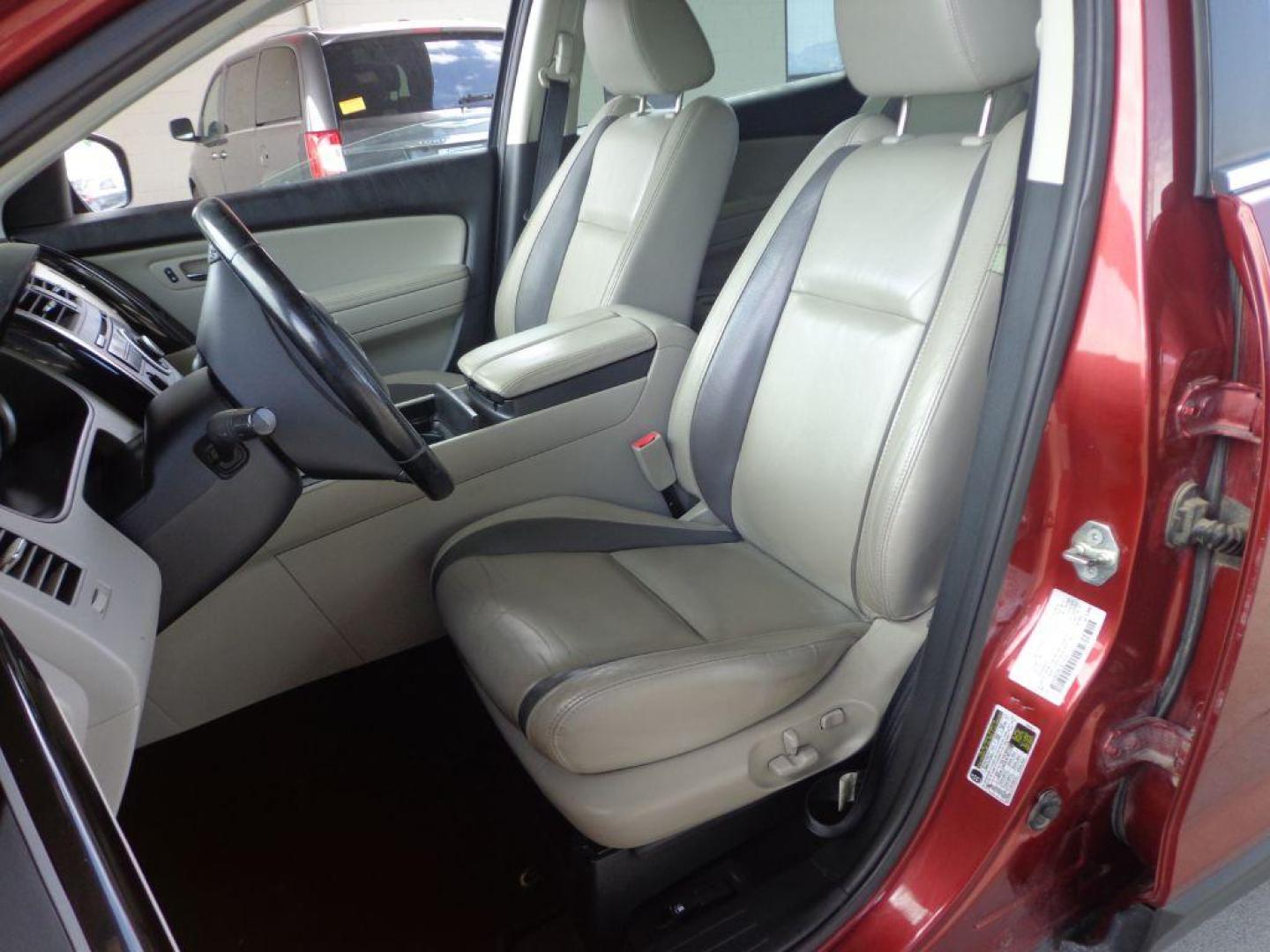 2012 MAROON MAZDA CX-9 (JM3TB3CA6C0) with an 3.7L engine, Automatic transmission, located at 6610 L St., Omaha, NE, 68117, (402) 731-7800, 41.212872, -96.014702 - FRESH TRADE- PRE INSPECTED- 3RD ROW- RUNS GREAT WITH NEWER TIRES! *****We have found that most customers do the majority of their shopping online before visiting a dealership. For this reason we feel it necessary to have a competitive price on our used vehicles right up front. We spend time r - Photo#13