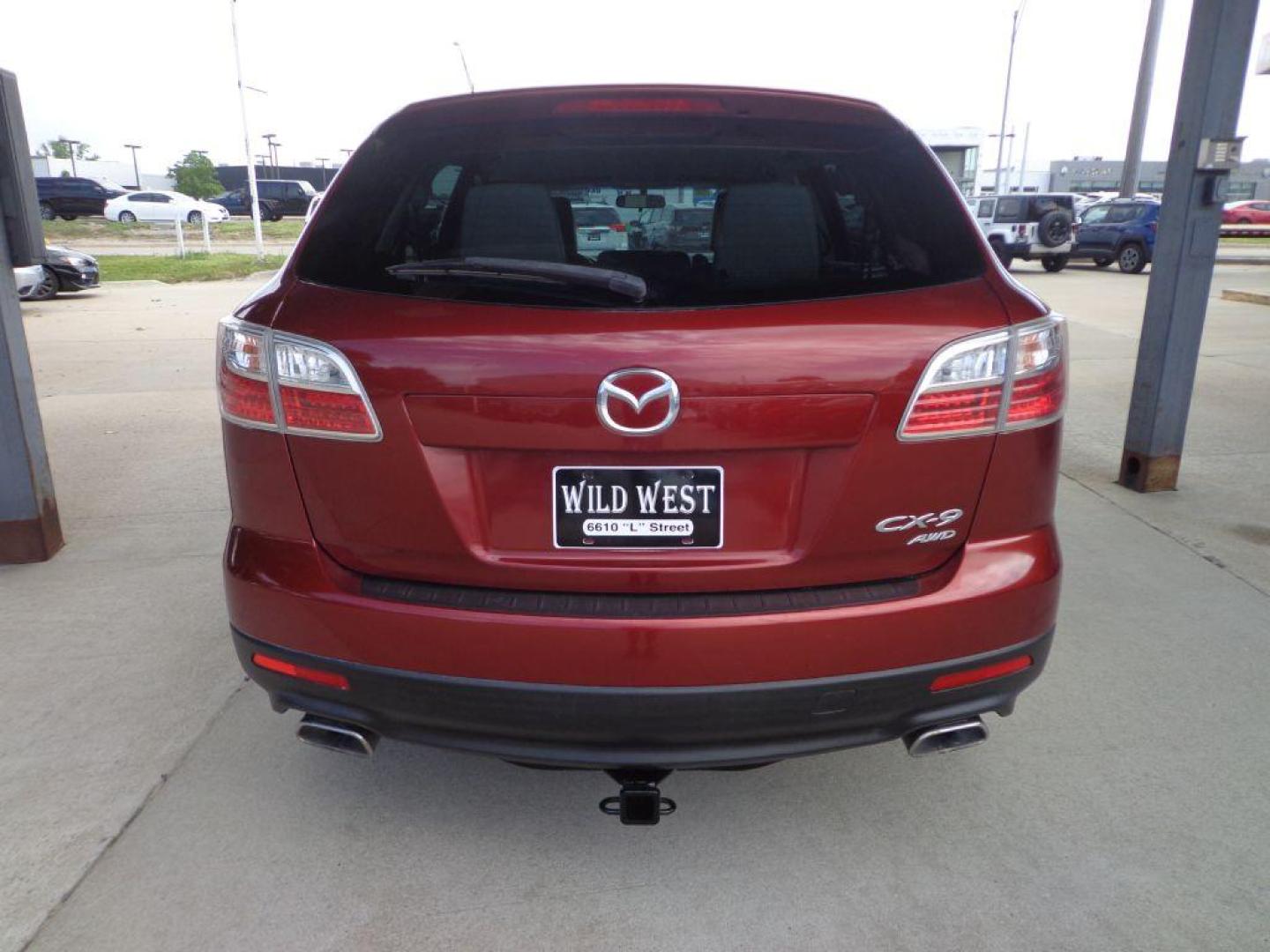 2012 MAROON MAZDA CX-9 (JM3TB3CA6C0) with an 3.7L engine, Automatic transmission, located at 6610 L St., Omaha, NE, 68117, (402) 731-7800, 41.212872, -96.014702 - FRESH TRADE- PRE INSPECTED- 3RD ROW- RUNS GREAT WITH NEWER TIRES! *****We have found that most customers do the majority of their shopping online before visiting a dealership. For this reason we feel it necessary to have a competitive price on our used vehicles right up front. We spend time r - Photo#4