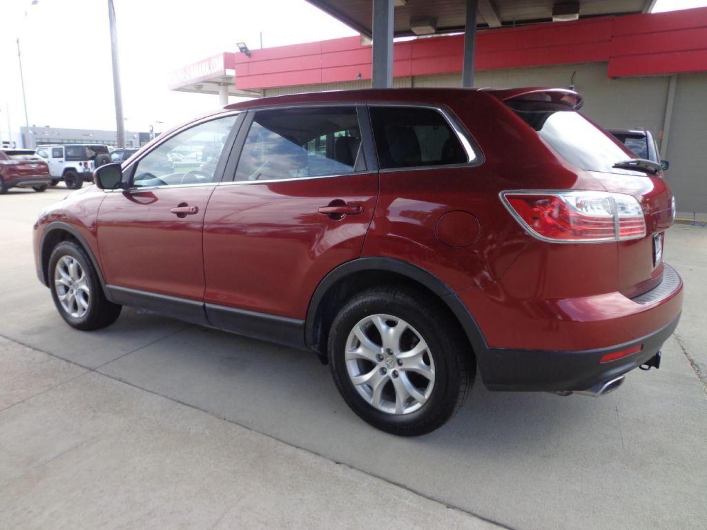 2012 MAROON MAZDA CX-9 (JM3TB3CA6C0) with an 3.7L engine, Automatic transmission, located at 6610 L St., Omaha, NE, 68117, (402) 731-7800, 41.212872, -96.014702 - FRESH TRADE- PRE INSPECTED- 3RD ROW- RUNS GREAT WITH NEWER TIRES! *****We have found that most customers do the majority of their shopping online before visiting a dealership. For this reason we feel it necessary to have a competitive price on our used vehicles right up front. We spend time r - Photo#5