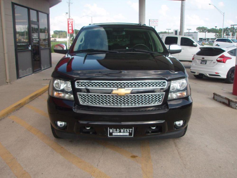 2013 BLACK CHEVROLET SUBURBAN 1500 LTZ (1GNSKKE70DR) with an 5.3L engine, Automatic transmission, located at 6610 L St., Omaha, NE, 68117, (402) 731-7800, 41.212872, -96.014702 - SHARP 2-OWNER CLEAN CARFAX LOW MILEAGE LOADED LTZ WITH NAV, BACKUP CAM, REAR ENTERTAINMENT, QUAD SEATING, BLIND SPOT ASSIST AND MUCH MORE! *****We have found that most customers do the majority of their shopping online before visiting a dealership. For this reason we feel it necessary to have - Photo #1
