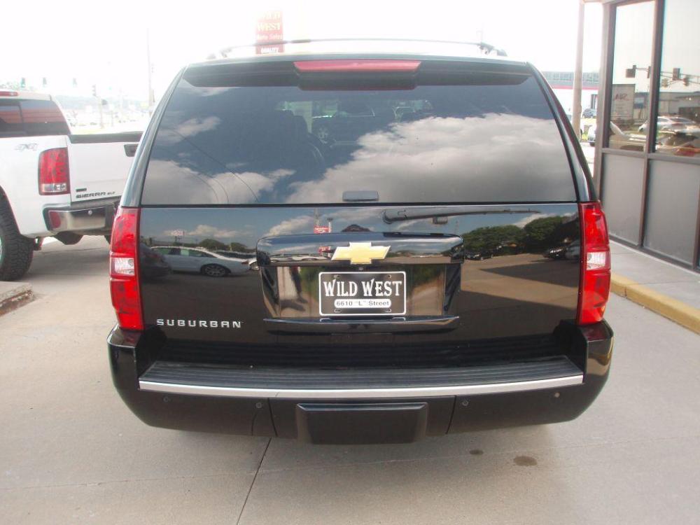2013 BLACK CHEVROLET SUBURBAN 1500 LTZ (1GNSKKE70DR) with an 5.3L engine, Automatic transmission, located at 6610 L St., Omaha, NE, 68117, (402) 731-7800, 41.212872, -96.014702 - SHARP 2-OWNER CLEAN CARFAX LOW MILEAGE LOADED LTZ WITH NAV, BACKUP CAM, REAR ENTERTAINMENT, QUAD SEATING, BLIND SPOT ASSIST AND MUCH MORE! *****We have found that most customers do the majority of their shopping online before visiting a dealership. For this reason we feel it necessary to have - Photo #4