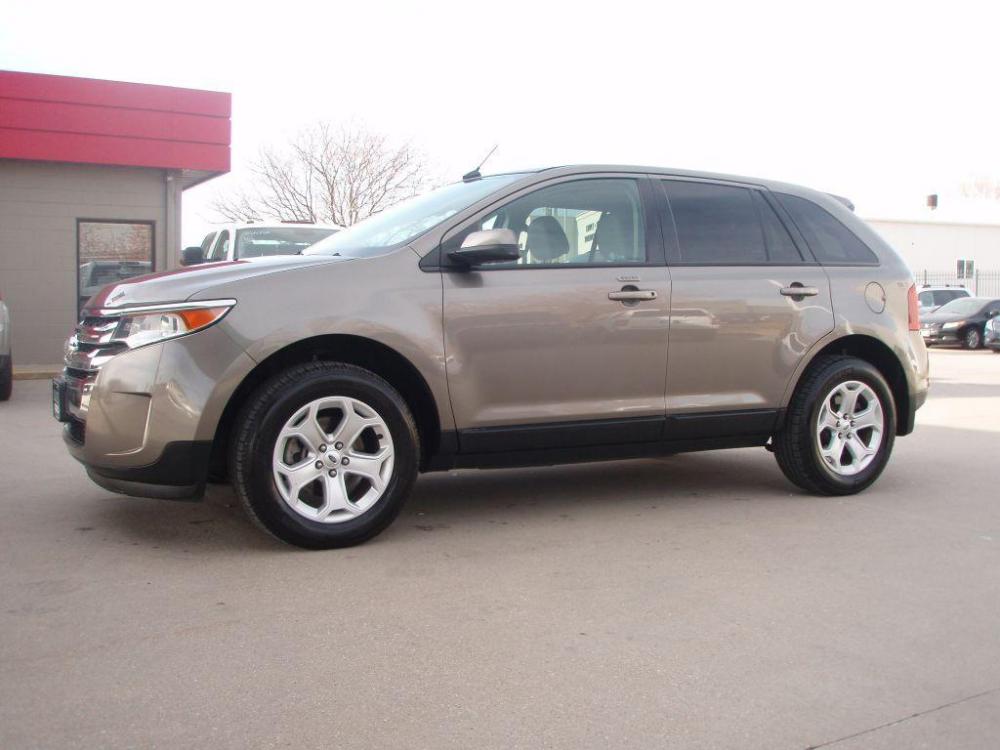 2013 TAN FORD EDGE SEL (2FMDK4JC7DB) with an 3.5L engine, Automatic transmission, located at 6610 L St., Omaha, NE, 68117, (402) 731-7800, 41.212872, -96.014702 - Photo #1