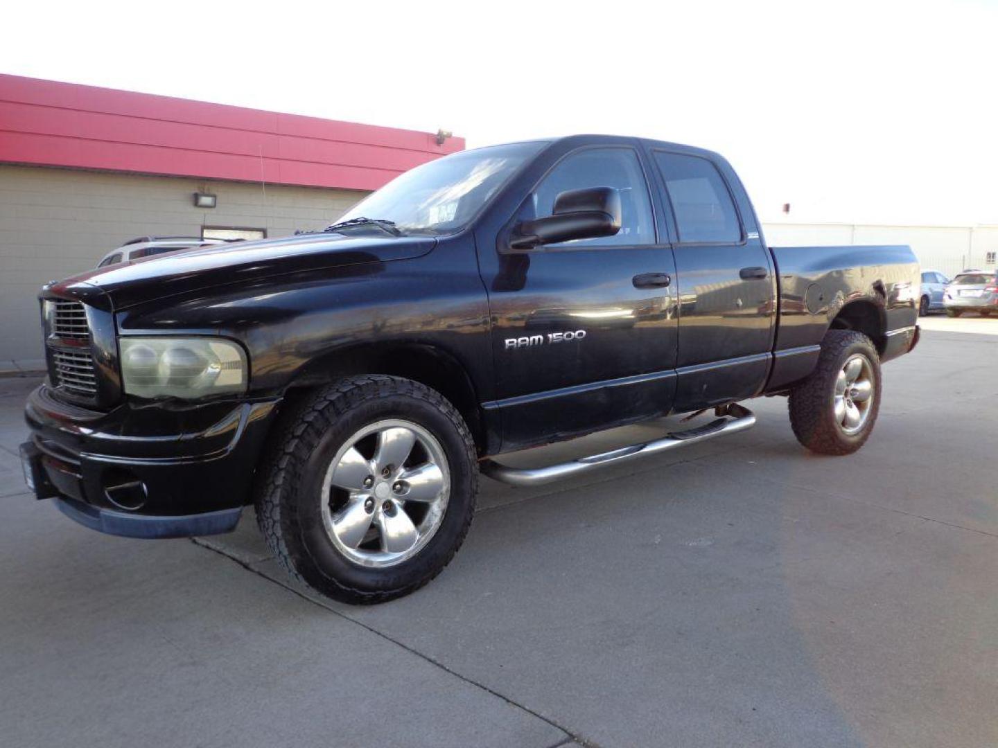 2002 BLACK DODGE RAM 1500 (1D7HU18Z22J) with an 5.9L engine, Automatic transmission, located at 6610 L St., Omaha, NE, 68117, (402) 731-7800, 41.212872, -96.014702 - Photo#0