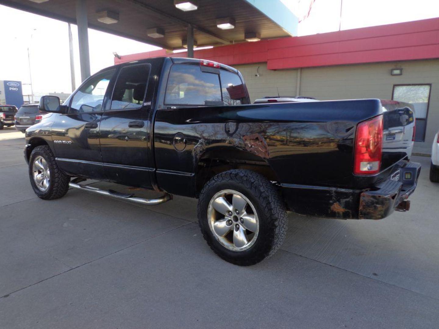 2002 BLACK DODGE RAM 1500 (1D7HU18Z22J) with an 5.9L engine, Automatic transmission, located at 6610 L St., Omaha, NE, 68117, (402) 731-7800, 41.212872, -96.014702 - Photo#5