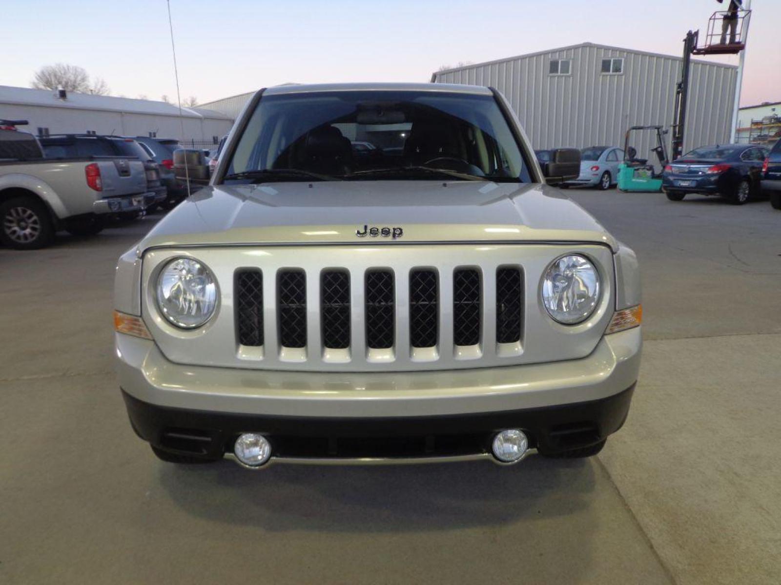 2013 SILVER JEEP PATRIOT LIMITED (1C4NJRCB2DD) with an 2.4L engine, Continuously Variable transmission, located at 6610 L St., Omaha, NE, 68117, (402) 731-7800, 41.212872, -96.014702 - 2-OWNER CLEAN CARFAX LOW MILEAGE LOADED WITH HEATED LEATHER, SUNROOF, NAV AND MUCH MORE! *****We have found that most customers do the majority of their shopping online before visiting a dealership. For this reason we feel it necessary to have a competitive price on our used vehicles right up f - Photo #1