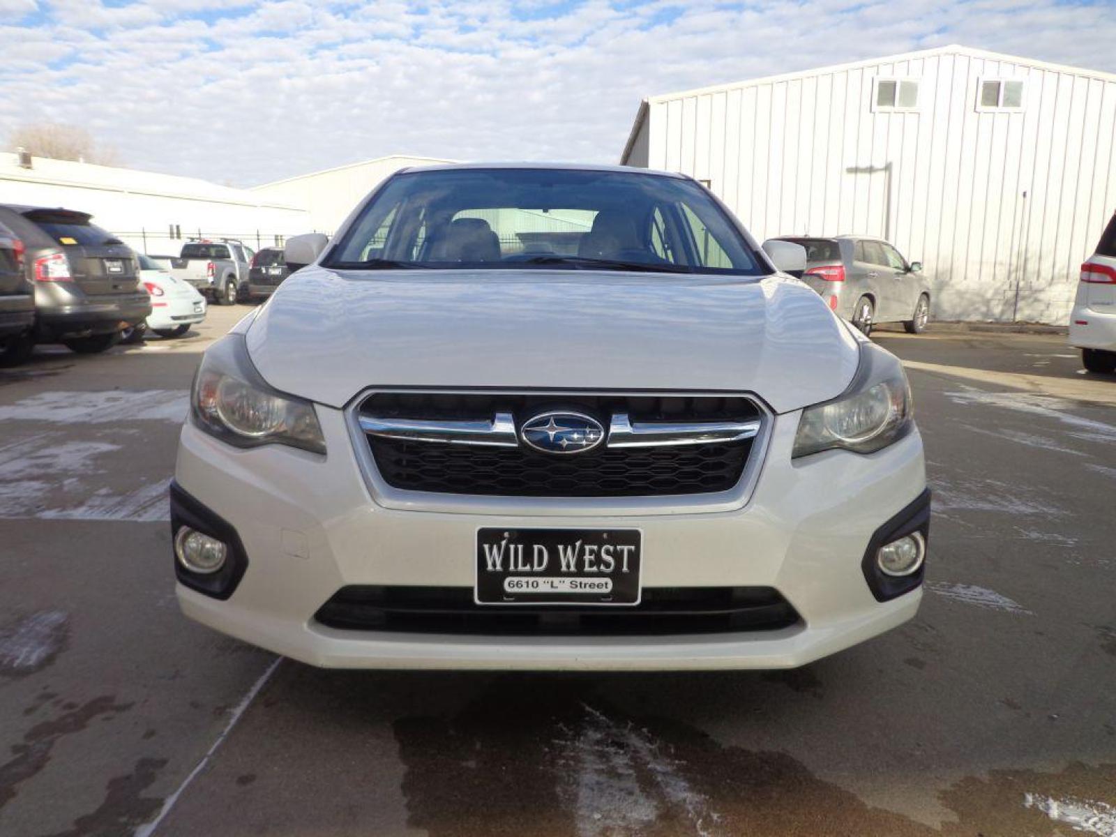2012 WHITE SUBARU IMPREZA LIMITED (JF1GJAH61CH) with an 2.0L engine, Continuously Variable transmission, located at 6610 L St., Omaha, NE, 68117, (402) 731-7800, 41.212872, -96.014702 - Photo #1