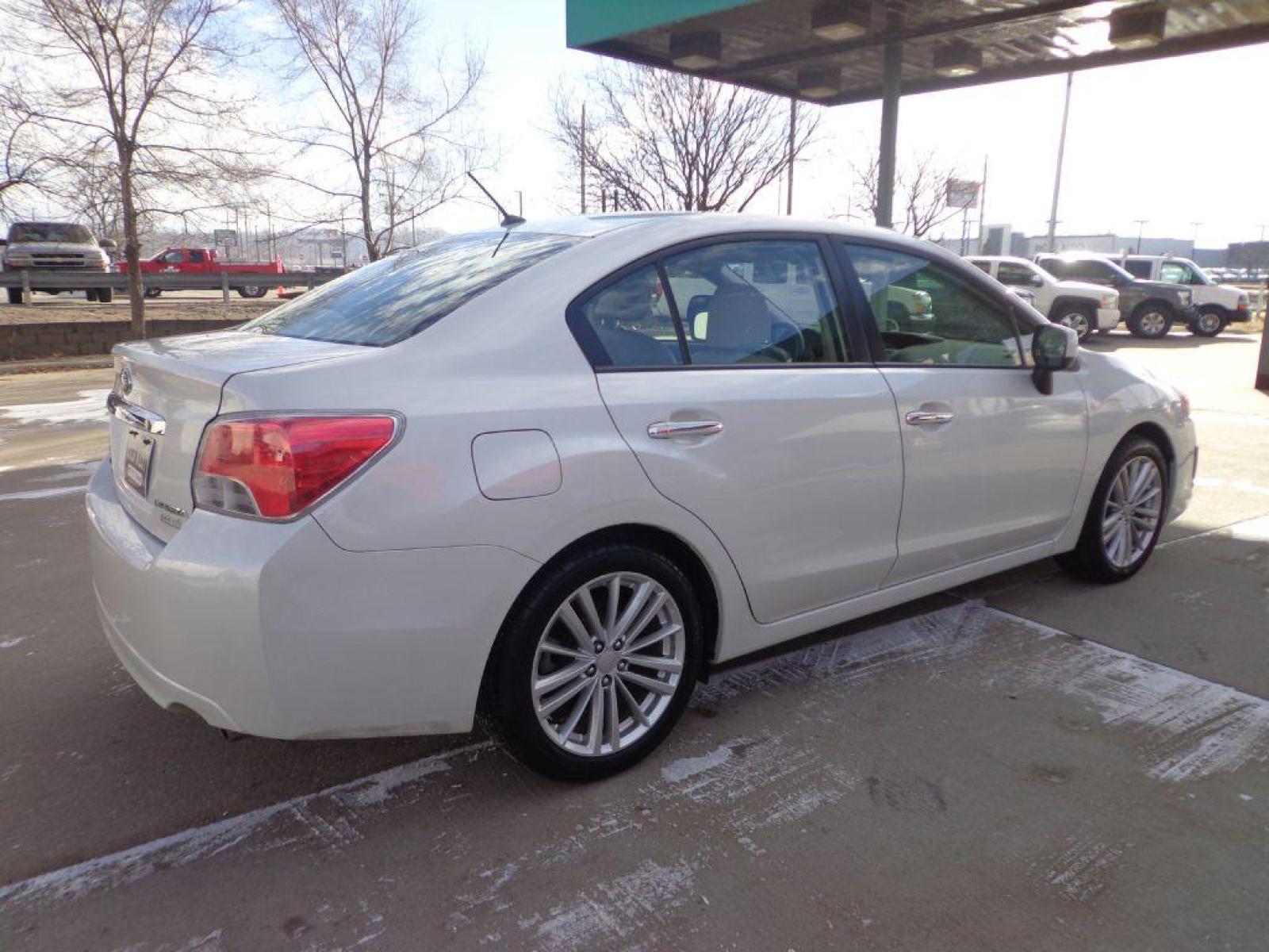 2012 WHITE SUBARU IMPREZA LIMITED (JF1GJAH61CH) with an 2.0L engine, Continuously Variable transmission, located at 6610 L St., Omaha, NE, 68117, (402) 731-7800, 41.212872, -96.014702 - Photo #3