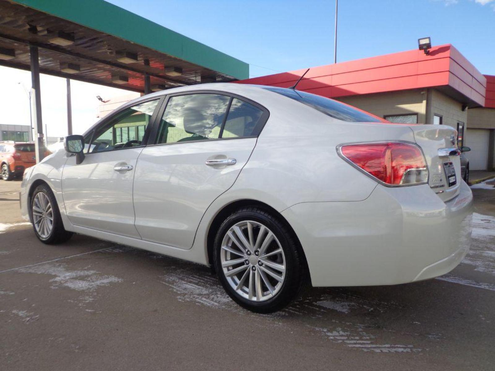 2012 WHITE SUBARU IMPREZA LIMITED (JF1GJAH61CH) with an 2.0L engine, Continuously Variable transmission, located at 6610 L St., Omaha, NE, 68117, (402) 731-7800, 41.212872, -96.014702 - Photo #5