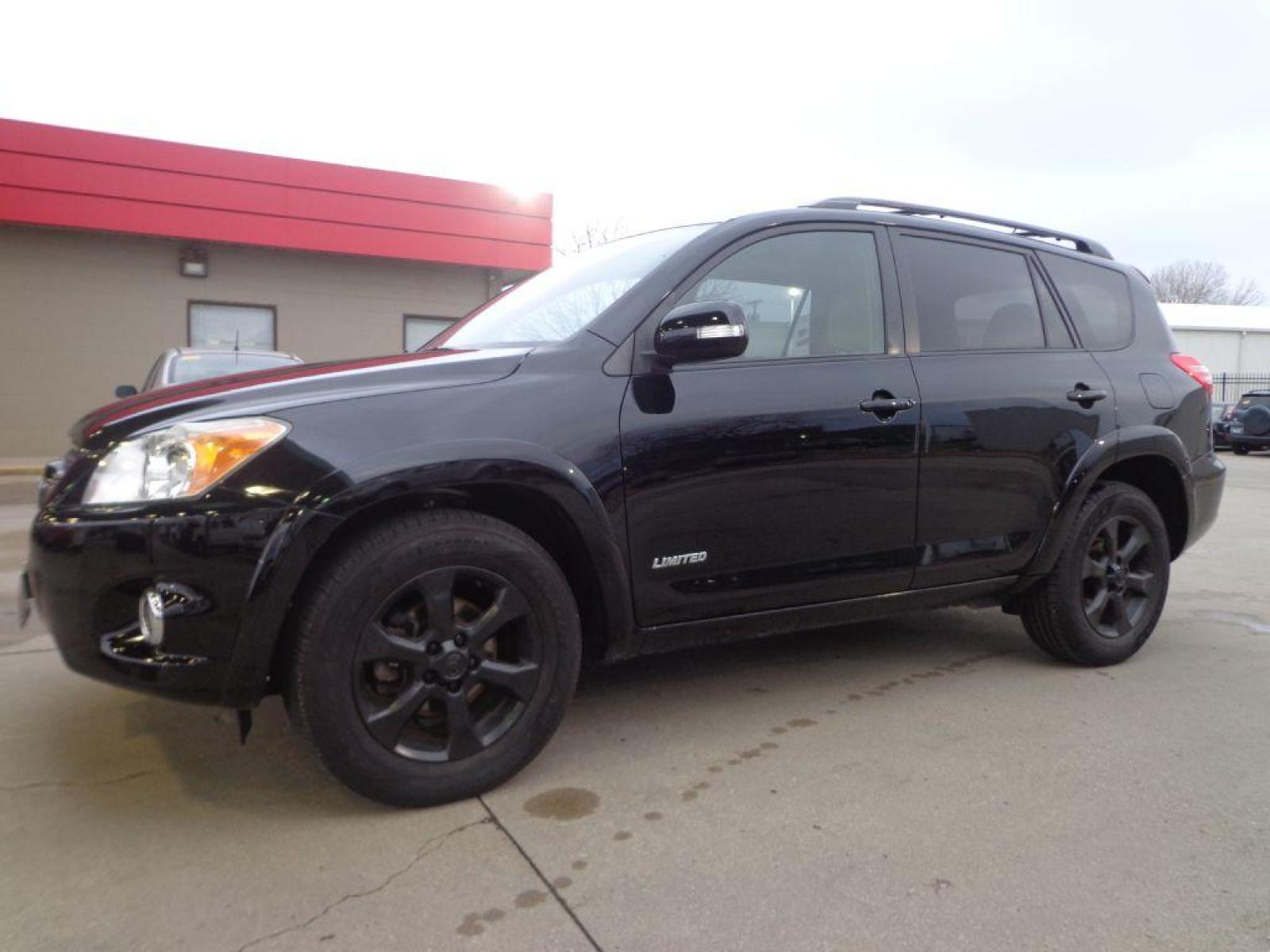 2011 BLACK TOYOTA RAV4 LIMITED (JTMDK4DVXB5) with an 3.5L engine, Automatic transmission, located at 6610 L St., Omaha, NE, 68117, (402) 731-7800, 41.212872, -96.014702 - CLEAN CARFAX LOW MILEAGE LOADED WITH HEATED SEATS, SUNROOF, JBL AUDIO AND NEWER TIRES! *****We have found that most customers do the majority of their shopping online before visiting a dealership. For this reason we feel it necessary to have a competitive price on our used vehicles right up fro - Photo #0