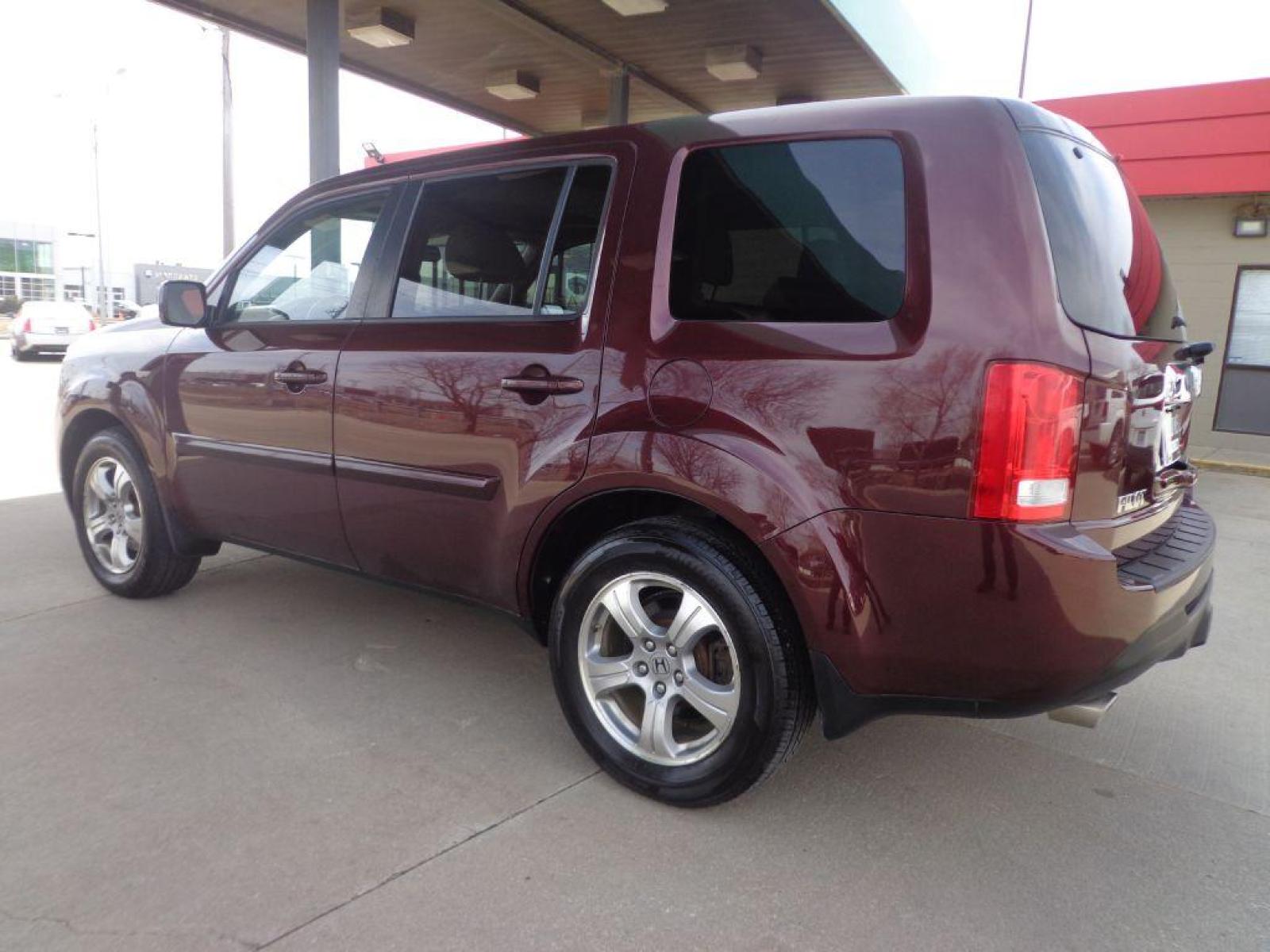 2015 MAROON HONDA PILOT EXL (5FNYF4H50FB) with an 3.5L engine, Automatic transmission, located at 6610 L St., Omaha, NE, 68117, (402) 731-7800, 41.212872, -96.014702 - 1-OWNER CLEAN CARFAX LOW MILEAGE WITH NEWER TIRES! *****We have found that most customers do the majority of their shopping online before visiting a dealership. For this reason we feel it necessary to have a competitive price on our used vehicles right up front. We spend time researching the re - Photo #5