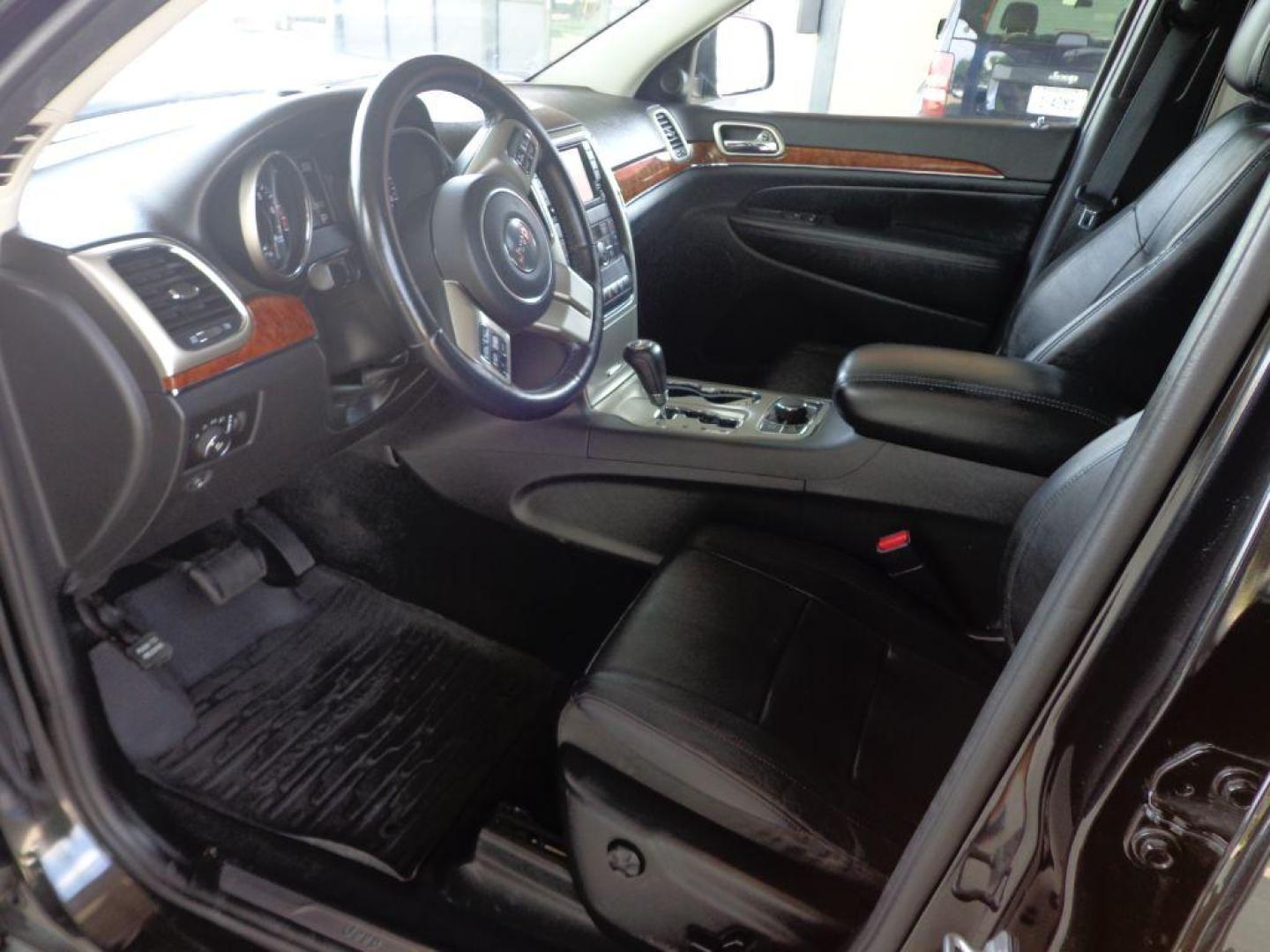 2013 BLACK JEEP GRAND CHEROKEE LIMITED (1C4RJFBT9DC) with an 5.7L engine, Automatic transmission, located at 6610 L St., Omaha, NE, 68117, (402) 731-7800, 41.212872, -96.014702 - 2-OWNER CLEAN CARFAX LOW MILEAGE LOADED WITH PANORAMIC ROOF, HEATED/COOLED SEATS, NAV, BACKUP CAM AND NEWER TIRES! *****We have found that most customers do the majority of their shopping online before visiting a dealership. For this reason we feel it necessary to have a competitive price on ou - Photo#13
