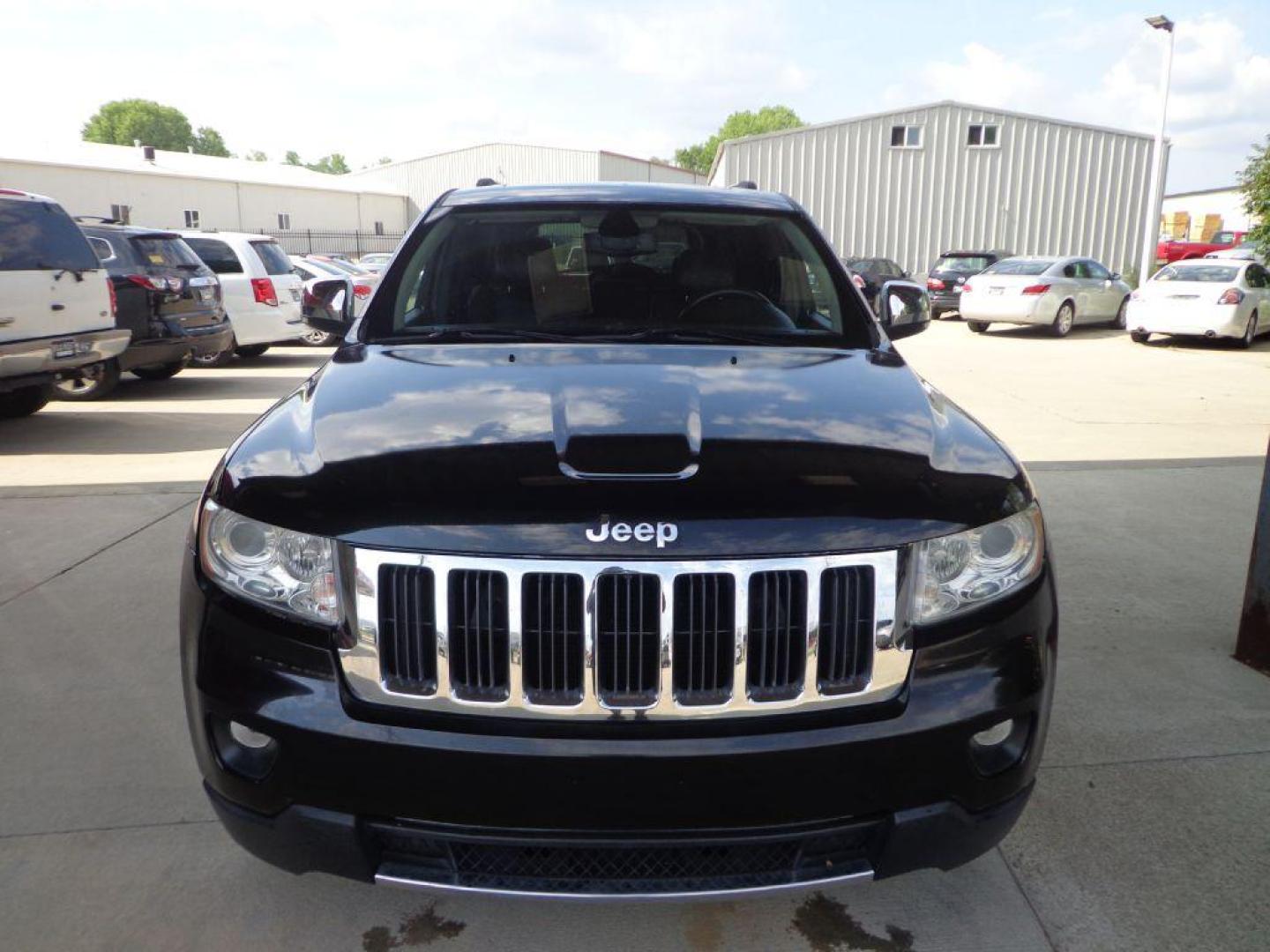 2013 BLACK JEEP GRAND CHEROKEE LIMITED (1C4RJFBT9DC) with an 5.7L engine, Automatic transmission, located at 6610 L St., Omaha, NE, 68117, (402) 731-7800, 41.212872, -96.014702 - 2-OWNER CLEAN CARFAX LOW MILEAGE LOADED WITH PANORAMIC ROOF, HEATED/COOLED SEATS, NAV, BACKUP CAM AND NEWER TIRES! *****We have found that most customers do the majority of their shopping online before visiting a dealership. For this reason we feel it necessary to have a competitive price on ou - Photo#1