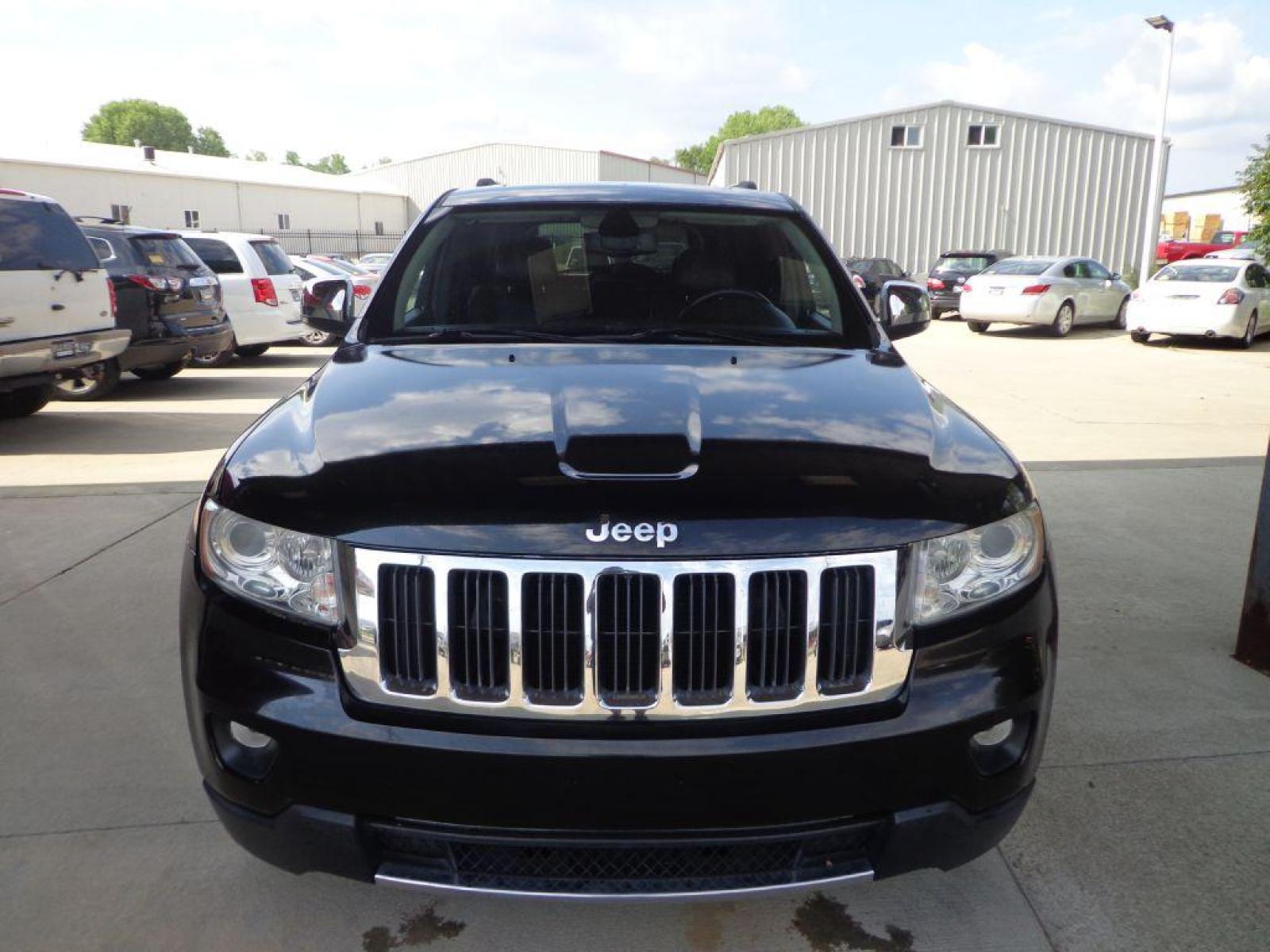 2013 BLACK JEEP GRAND CHEROKEE LIMITED (1C4RJFBT9DC) with an 5.7L engine, Automatic transmission, located at 6610 L St., Omaha, NE, 68117, (402) 731-7800, 41.212872, -96.014702 - 2-OWNER CLEAN CARFAX LOW MILEAGE LOADED WITH PANORAMIC ROOF, HEATED/COOLED SEATS, NAV, BACKUP CAM AND NEWER TIRES! *****We have found that most customers do the majority of their shopping online before visiting a dealership. For this reason we feel it necessary to have a competitive price on ou - Photo #1