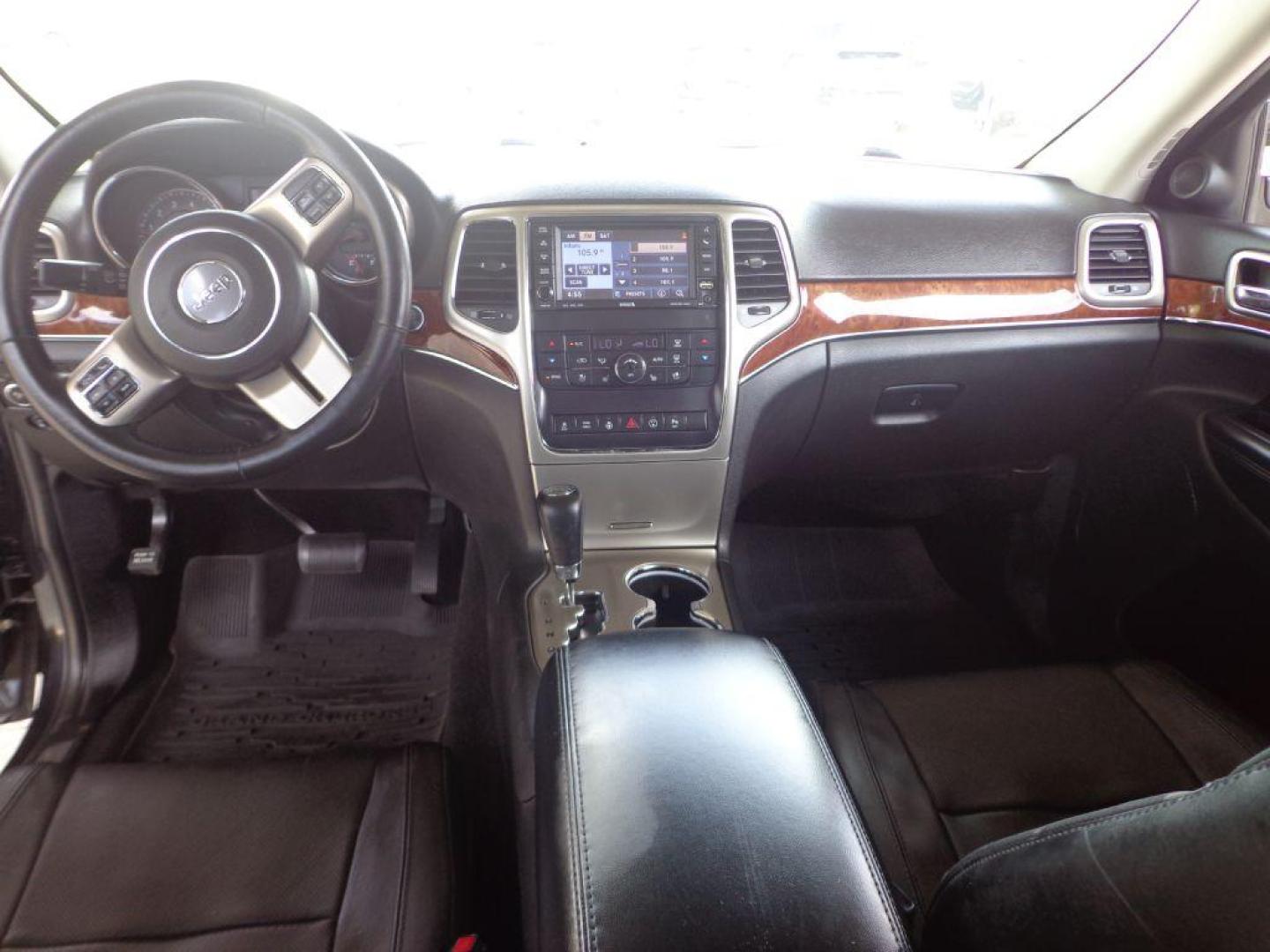 2013 BLACK JEEP GRAND CHEROKEE LIMITED (1C4RJFBT9DC) with an 5.7L engine, Automatic transmission, located at 6610 L St., Omaha, NE, 68117, (402) 731-7800, 41.212872, -96.014702 - 2-OWNER CLEAN CARFAX LOW MILEAGE LOADED WITH PANORAMIC ROOF, HEATED/COOLED SEATS, NAV, BACKUP CAM AND NEWER TIRES! *****We have found that most customers do the majority of their shopping online before visiting a dealership. For this reason we feel it necessary to have a competitive price on ou - Photo#21