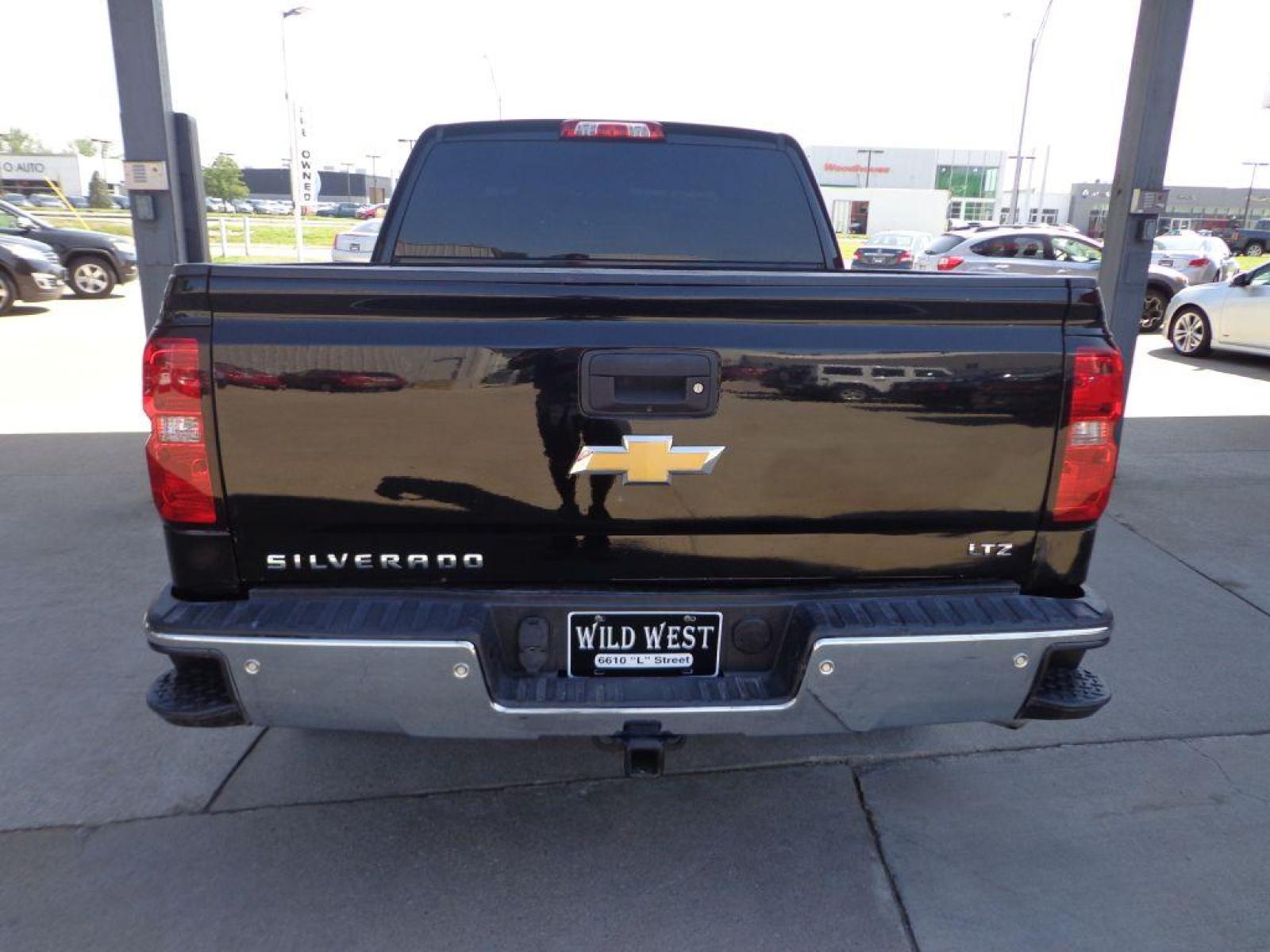 2014 BLACK CHEVROLET SILVERADO 1500 LTZ (3GCUKSECXEG) with an 5.3L engine, Automatic transmission, located at 6610 L St., Omaha, NE, 68117, (402) 731-7800, 41.212872, -96.014702 - 2-OWNER RUST-FREE Z71 WITH A CLEAN CARFAX, LOW MILEAGE, NAV, SUNROOF AND A NICE SET OF MICHELINS! *****We have found that most customers do the majority of their shopping online before visiting a dealership. For this reason we feel it necessary to have a competitive price on our used vehicles - Photo #4