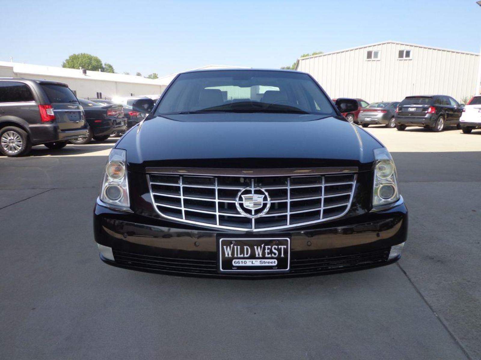 2009 BROWN CADILLAC DTS (1G6KD57Y39U) with an 4.6L engine, Automatic transmission, located at 6610 L St., Omaha, NE, 68117, (402) 731-7800, 41.212872, -96.014702 - SHARP LOOKING TRADE-IN RUNS AND DRIVES WELL WITH NAV, PARK ASSIST, SUNROOF AND NEWER TIRES! *****We have found that most customers do the majority of their shopping online before visiting a dealership. For this reason we feel it necessary to have a competitive price on our used vehicles right - Photo #1