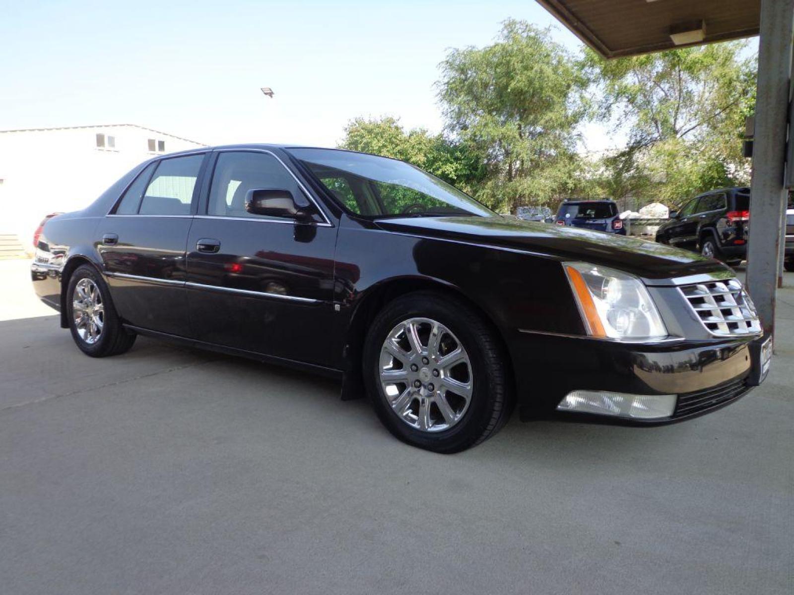 2009 BROWN CADILLAC DTS (1G6KD57Y39U) with an 4.6L engine, Automatic transmission, located at 6610 L St., Omaha, NE, 68117, (402) 731-7800, 41.212872, -96.014702 - SHARP LOOKING TRADE-IN RUNS AND DRIVES WELL WITH NAV, PARK ASSIST, SUNROOF AND NEWER TIRES! *****We have found that most customers do the majority of their shopping online before visiting a dealership. For this reason we feel it necessary to have a competitive price on our used vehicles right - Photo #2