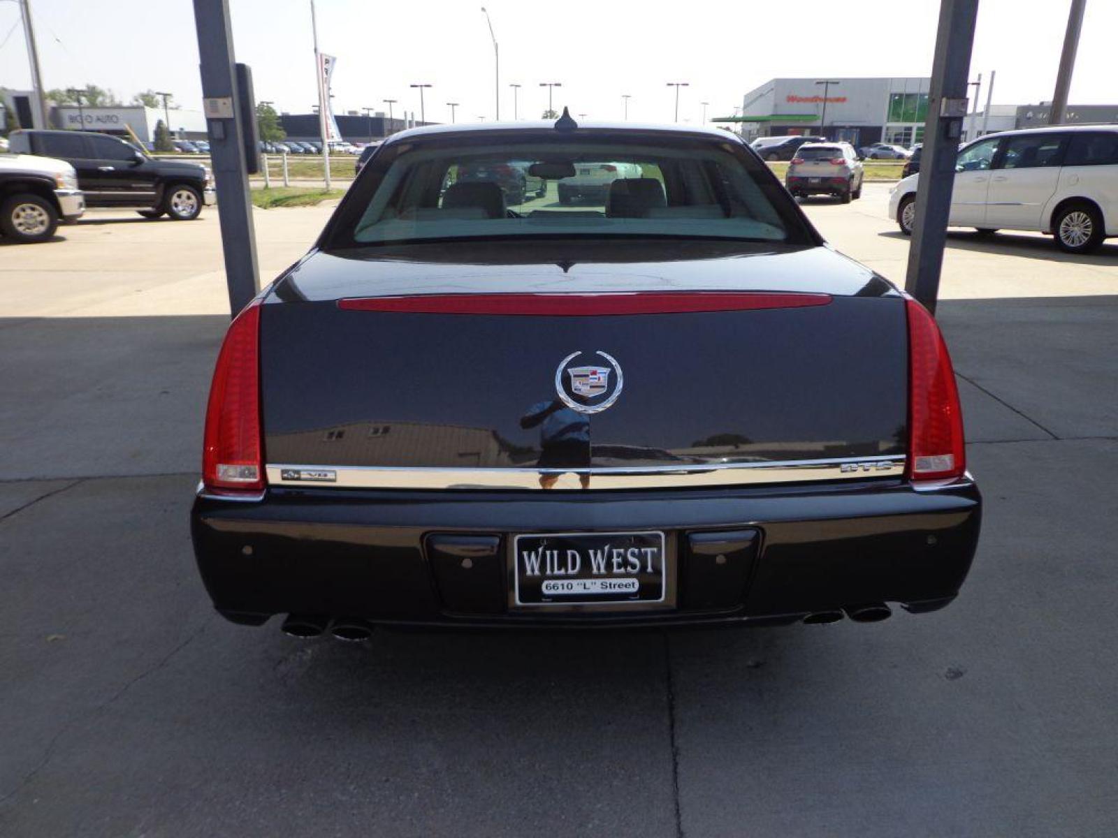 2009 BROWN CADILLAC DTS (1G6KD57Y39U) with an 4.6L engine, Automatic transmission, located at 6610 L St., Omaha, NE, 68117, (402) 731-7800, 41.212872, -96.014702 - SHARP LOOKING TRADE-IN RUNS AND DRIVES WELL WITH NAV, PARK ASSIST, SUNROOF AND NEWER TIRES! *****We have found that most customers do the majority of their shopping online before visiting a dealership. For this reason we feel it necessary to have a competitive price on our used vehicles right - Photo #4