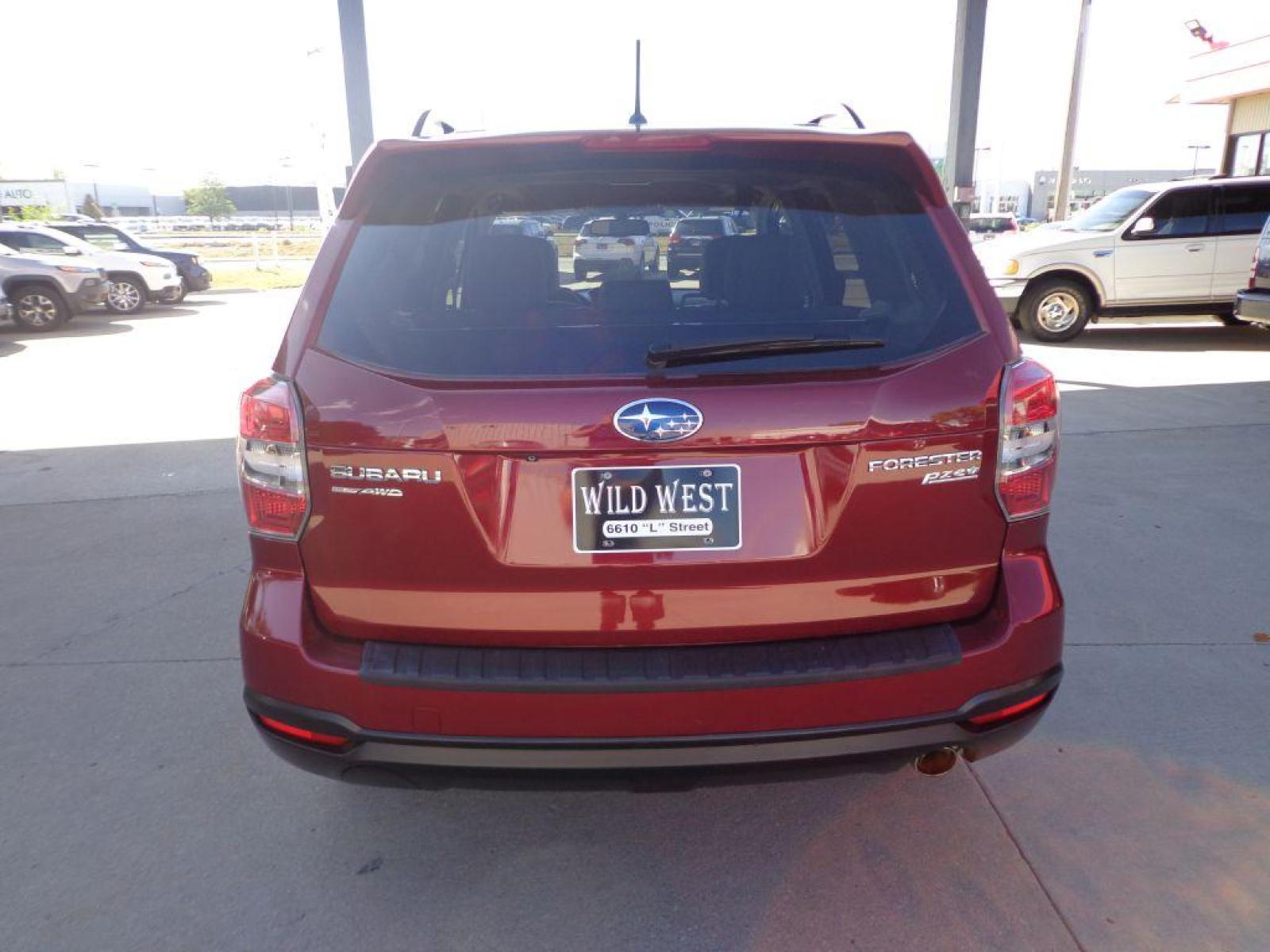 2014 MAROON SUBARU FORESTER 2.5I LIMITED (JF2SJAHC5EH) with an 2.5L engine, Continuously Variable transmission, located at 6610 L St., Omaha, NE, 68117, (402) 731-7800, 41.212872, -96.014702 - 1-OWNER CLEAN CARFAX LOW MILEAGE WITH PANORAMIC ROOF, BACKUP CAM, HEATED SEATS, REMOTE START AND NEWER TIRES! *****We have found that most customers do the majority of their shopping online before visiting a dealership. For this reason we feel it necessary to have a competitive price on our use - Photo #4