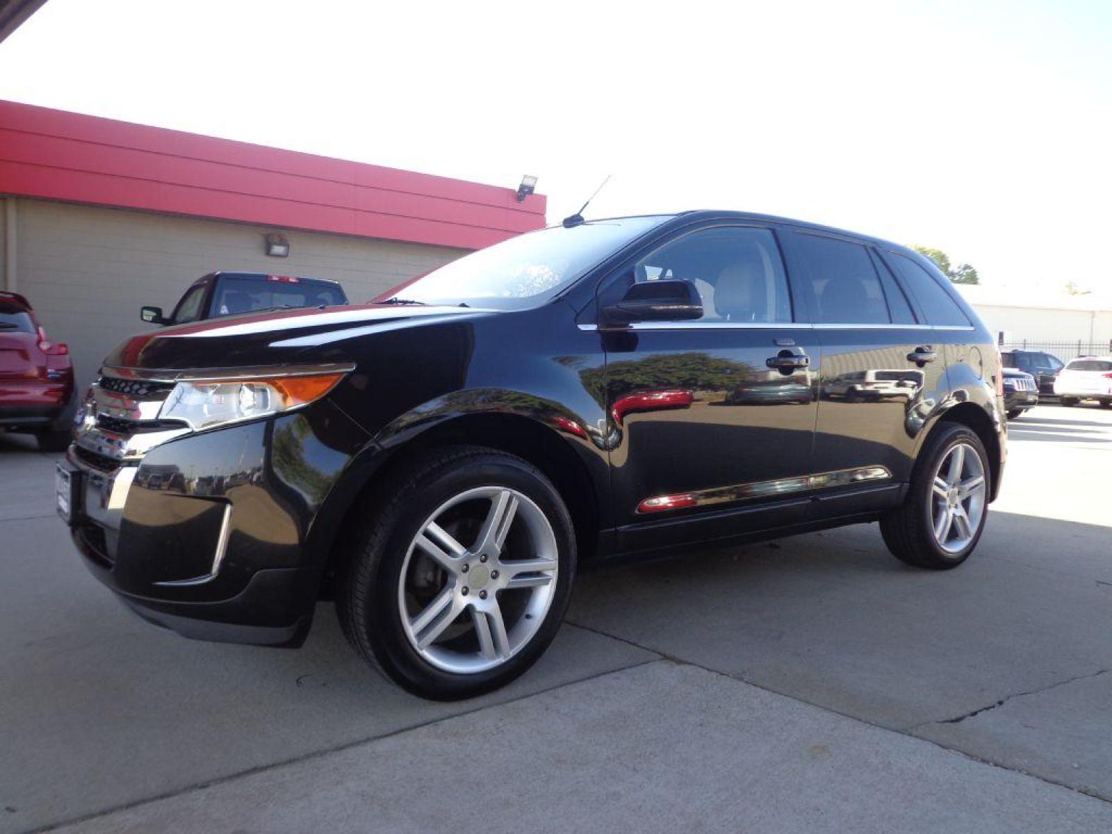 2013 BLACK FORD EDGE LIMITED (2FMDK4KC1DB) with an 3.5L engine, Automatic transmission, located at 6610 L St., Omaha, NE, 68117, (402) 731-7800, 41.212872, -96.014702 - 2-OWNER CLEAN CARFAX LOW MILEAGE LOADED WITH OPTIONS INCLUDING: NAV, BACKUP CAM, PANORAMIC ROOF, ADAPTIVE CRUISE, HID HEADLAMPS, POWER LIFTGATE, VISION PACKAGE, BLIND SPOT ASSIST AND NEWER TIRES! *****We have found that most customers do the majority of their shopping online before visitin - Photo #0