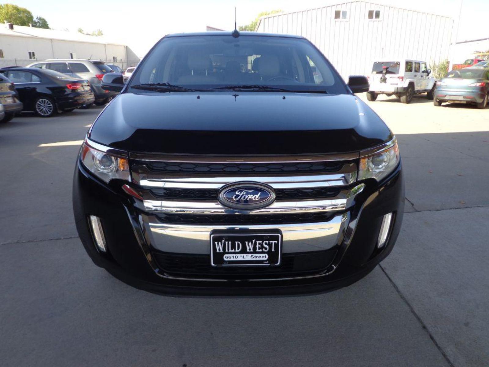 2013 BLACK FORD EDGE LIMITED (2FMDK4KC1DB) with an 3.5L engine, Automatic transmission, located at 6610 L St., Omaha, NE, 68117, (402) 731-7800, 41.212872, -96.014702 - 2-OWNER CLEAN CARFAX LOW MILEAGE LOADED WITH OPTIONS INCLUDING: NAV, BACKUP CAM, PANORAMIC ROOF, ADAPTIVE CRUISE, HID HEADLAMPS, POWER LIFTGATE, VISION PACKAGE, BLIND SPOT ASSIST AND NEWER TIRES! *****We have found that most customers do the majority of their shopping online before visitin - Photo #1