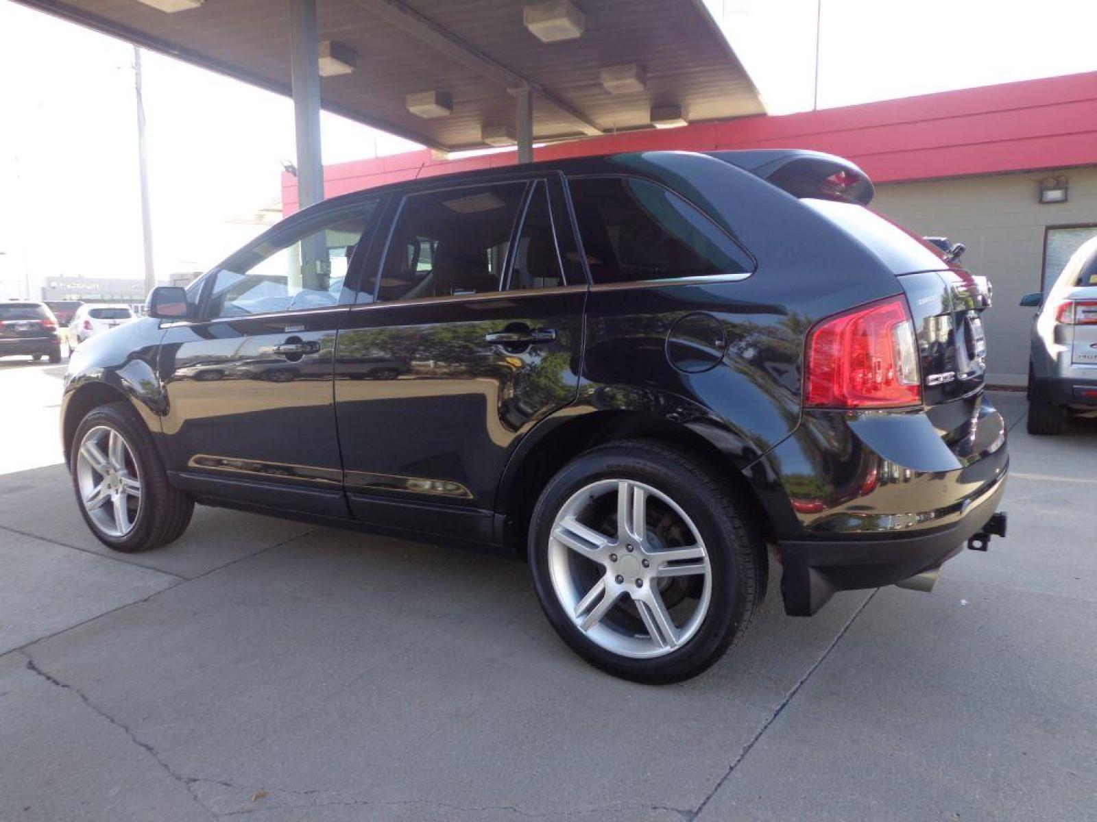 2013 BLACK FORD EDGE LIMITED (2FMDK4KC1DB) with an 3.5L engine, Automatic transmission, located at 6610 L St., Omaha, NE, 68117, (402) 731-7800, 41.212872, -96.014702 - 2-OWNER CLEAN CARFAX LOW MILEAGE LOADED WITH OPTIONS INCLUDING: NAV, BACKUP CAM, PANORAMIC ROOF, ADAPTIVE CRUISE, HID HEADLAMPS, POWER LIFTGATE, VISION PACKAGE, BLIND SPOT ASSIST AND NEWER TIRES! *****We have found that most customers do the majority of their shopping online before visitin - Photo #5