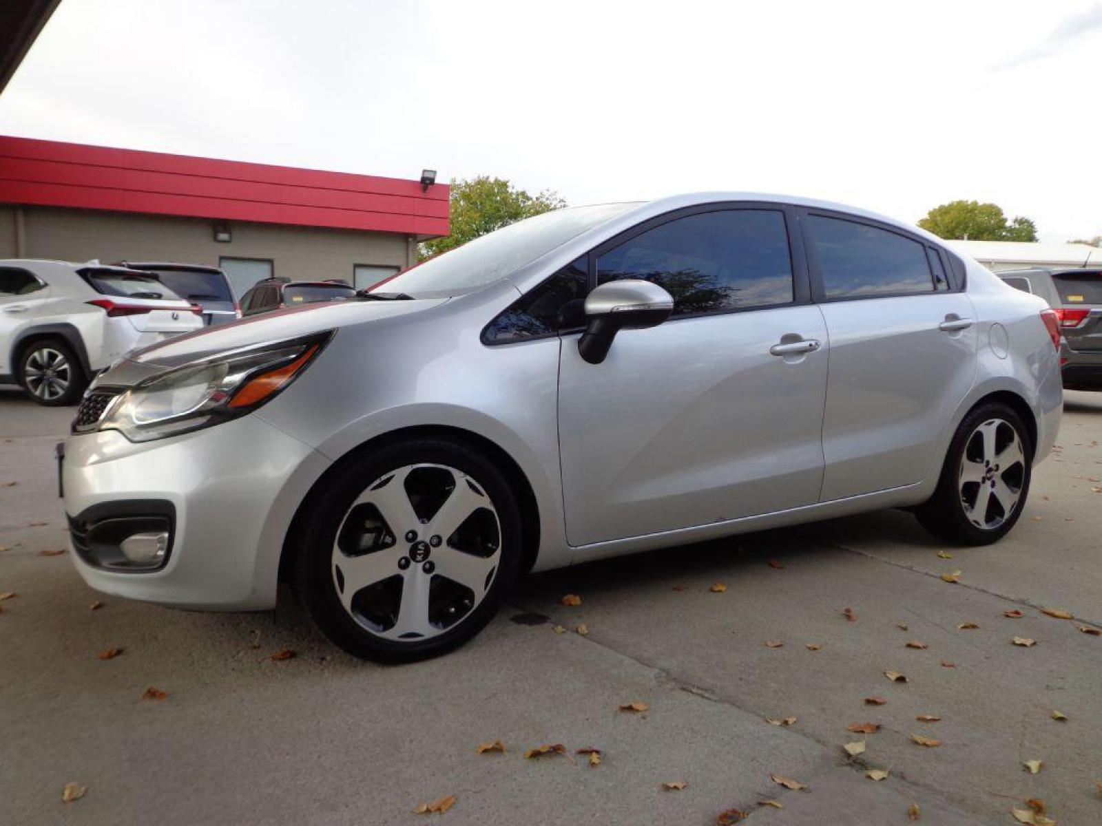 2013 SILVER KIA RIO SX (KNADN4A3XD6) with an 1.6L engine, Automatic transmission, located at 6610 L St., Omaha, NE, 68117, (402) 731-7800, 41.212872, -96.014702 - 2-OWNER CLEAN CARFAX LOW MILEAGE LOADED WITH HEATED LEATHER, NAV, BACKUP CAM, SUNROOF AND NEWER TIRES! *****We have found that most customers do the majority of their shopping online before visiting a dealership. For this reason we feel it necessary to have a competitive price on our used veh - Photo #0