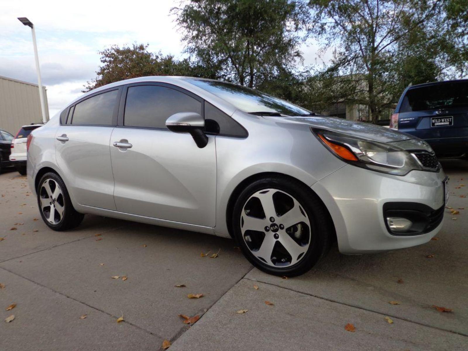 2013 SILVER KIA RIO SX (KNADN4A3XD6) with an 1.6L engine, Automatic transmission, located at 6610 L St., Omaha, NE, 68117, (402) 731-7800, 41.212872, -96.014702 - 2-OWNER CLEAN CARFAX LOW MILEAGE LOADED WITH HEATED LEATHER, NAV, BACKUP CAM, SUNROOF AND NEWER TIRES! *****We have found that most customers do the majority of their shopping online before visiting a dealership. For this reason we feel it necessary to have a competitive price on our used veh - Photo #2