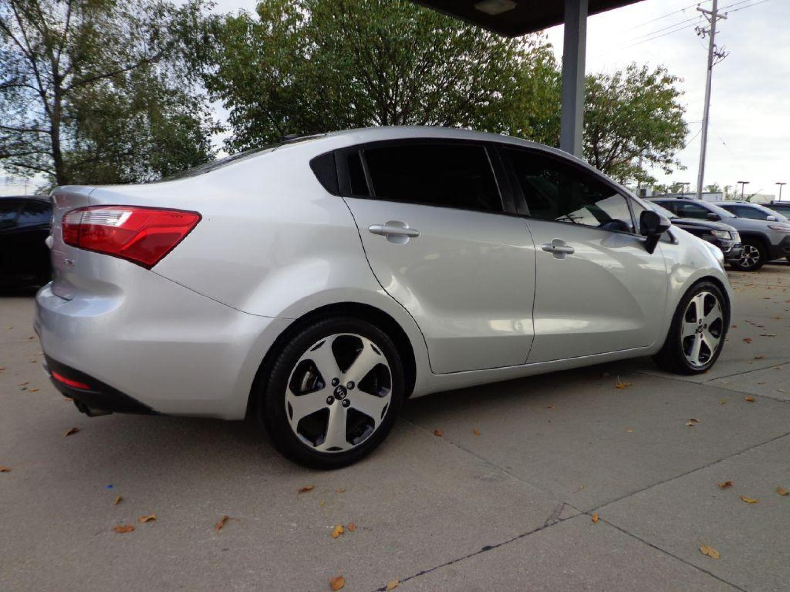 2013 SILVER KIA RIO SX (KNADN4A3XD6) with an 1.6L engine, Automatic transmission, located at 6610 L St., Omaha, NE, 68117, (402) 731-7800, 41.212872, -96.014702 - 2-OWNER CLEAN CARFAX LOW MILEAGE LOADED WITH HEATED LEATHER, NAV, BACKUP CAM, SUNROOF AND NEWER TIRES! *****We have found that most customers do the majority of their shopping online before visiting a dealership. For this reason we feel it necessary to have a competitive price on our used veh - Photo #3