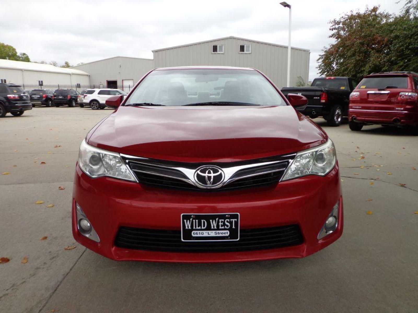 2012 RED TOYOTA CAMRY XLE (4T4BF1FK8CR) with an 2.5L engine, Automatic transmission, located at 6610 L St., Omaha, NE, 68117, (402) 731-7800, 41.212872, -96.014702 - 1-OWNER CLEAN CARFAX LOW MILEAGE WITH A SUNROOF AND NEWER TIRES! *****We have found that most customers do the majority of their shopping online before visiting a dealership. For this reason we feel it necessary to have a competitive price on our used vehicles right up front. We spend time re - Photo #1
