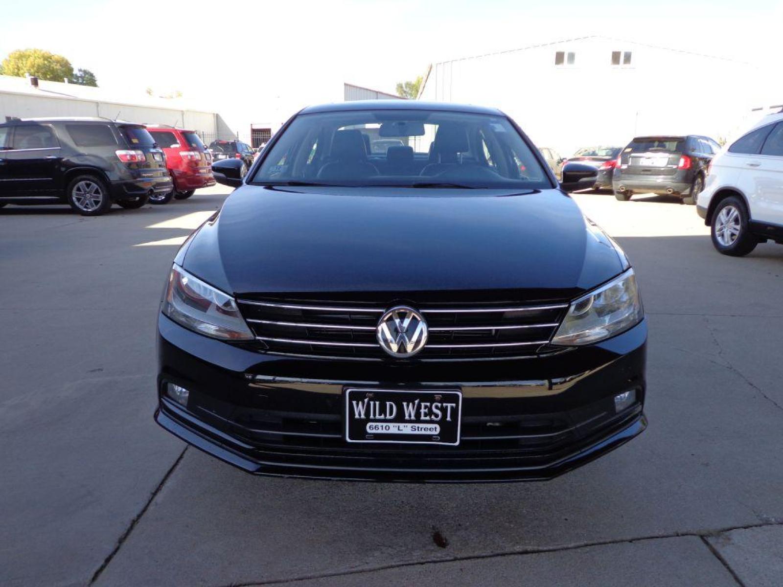 2015 BLACK VOLKSWAGEN JETTA SE (3VWD17AJ8FM) with an 1.8L engine, Automatic transmission, located at 6610 L St., Omaha, NE, 68117, (402) 731-7800, 41.212872, -96.014702 - SHARP LOADED UP JETTA WITH LOW MILEAGE AND NEWER TIRES! *****We have found that most customers do the majority of their shopping online before visiting a dealership. For this reason we feel it necessary to have a competitive price on our used vehicles right up front. We spend time researching t - Photo #1