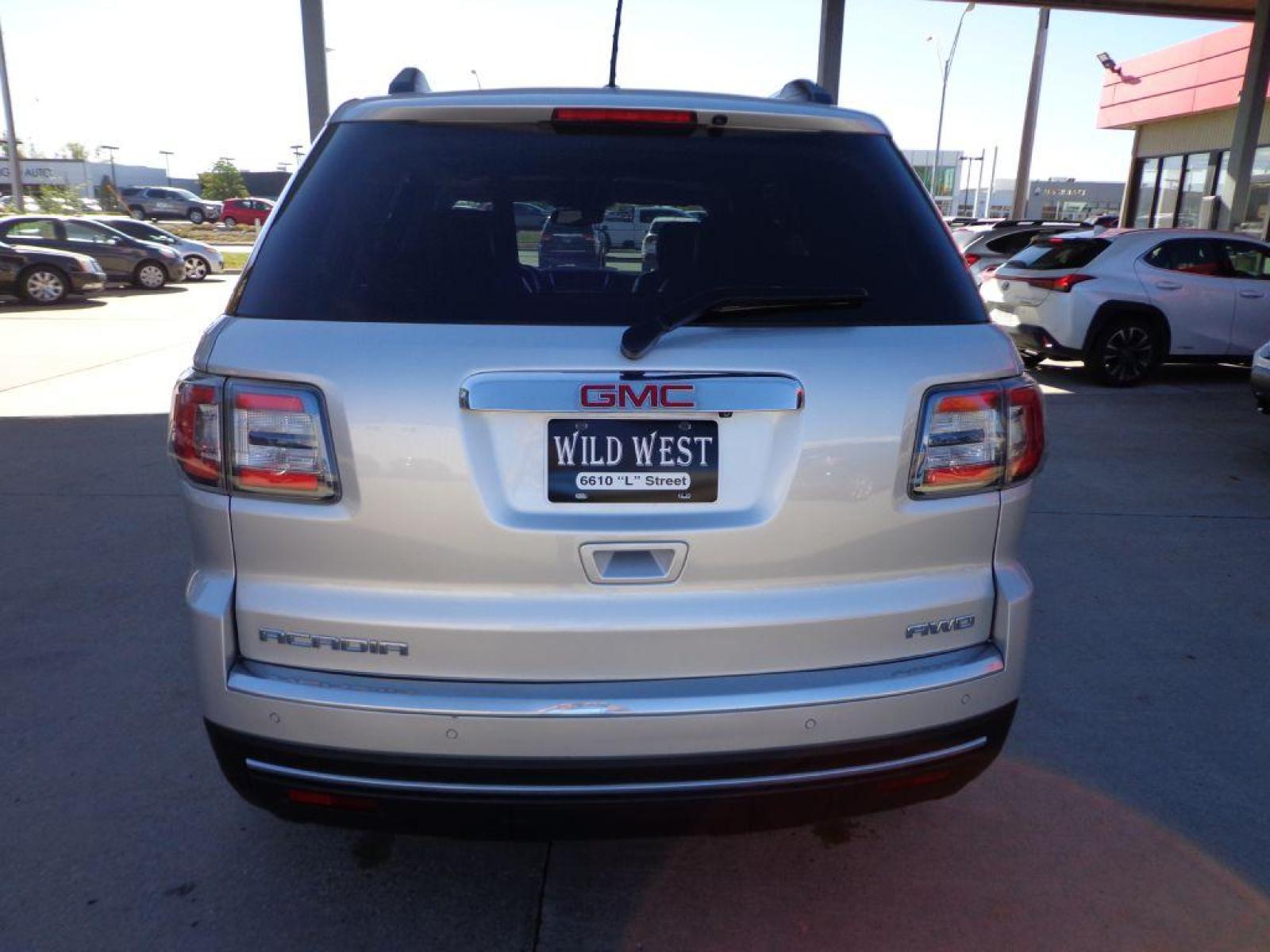 2014 SILVER GMC ACADIA SLT-1 (1GKKVRKD7EJ) with an 3.6L engine, Automatic transmission, located at 6610 L St., Omaha, NE, 68117, (402) 731-7800, 41.212872, -96.014702 - 2-OWNER CLEAN CARFAX LOW MILEAGE LOADED WITH HEATED LEATHER, DUAL SUNROOF, NAV, BACKUP CAM, BOSE AUDIO, POWER LIFTGATE AND MUCH MORE! *****We have found that most customers do the majority of their shopping online before visiting a dealership. For this reason we feel it necessary to have a comp - Photo #4