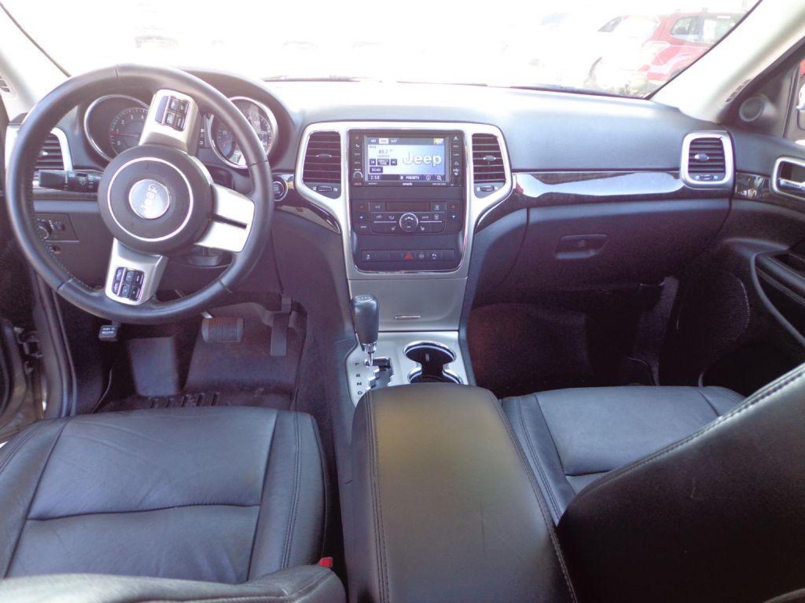 2012 GRAY JEEP GRAND CHEROKEE LAREDO (1C4RJFAG7CC) with an 3.6L engine, Automatic transmission, located at 6610 L St., Omaha, NE, 68117, (402) 731-7800, 41.212872, -96.014702 - 2-OWNER CLEAN CARFAX LOW MILEAGE LOADED WITH HEATED LEATHER, SUNROOF, NAV AND BACKUP CAM! *****We have found that most customers do the majority of their shopping online before visiting a dealership. For this reason we feel it necessary to have a competitive price on our used vehicles right up - Photo #21