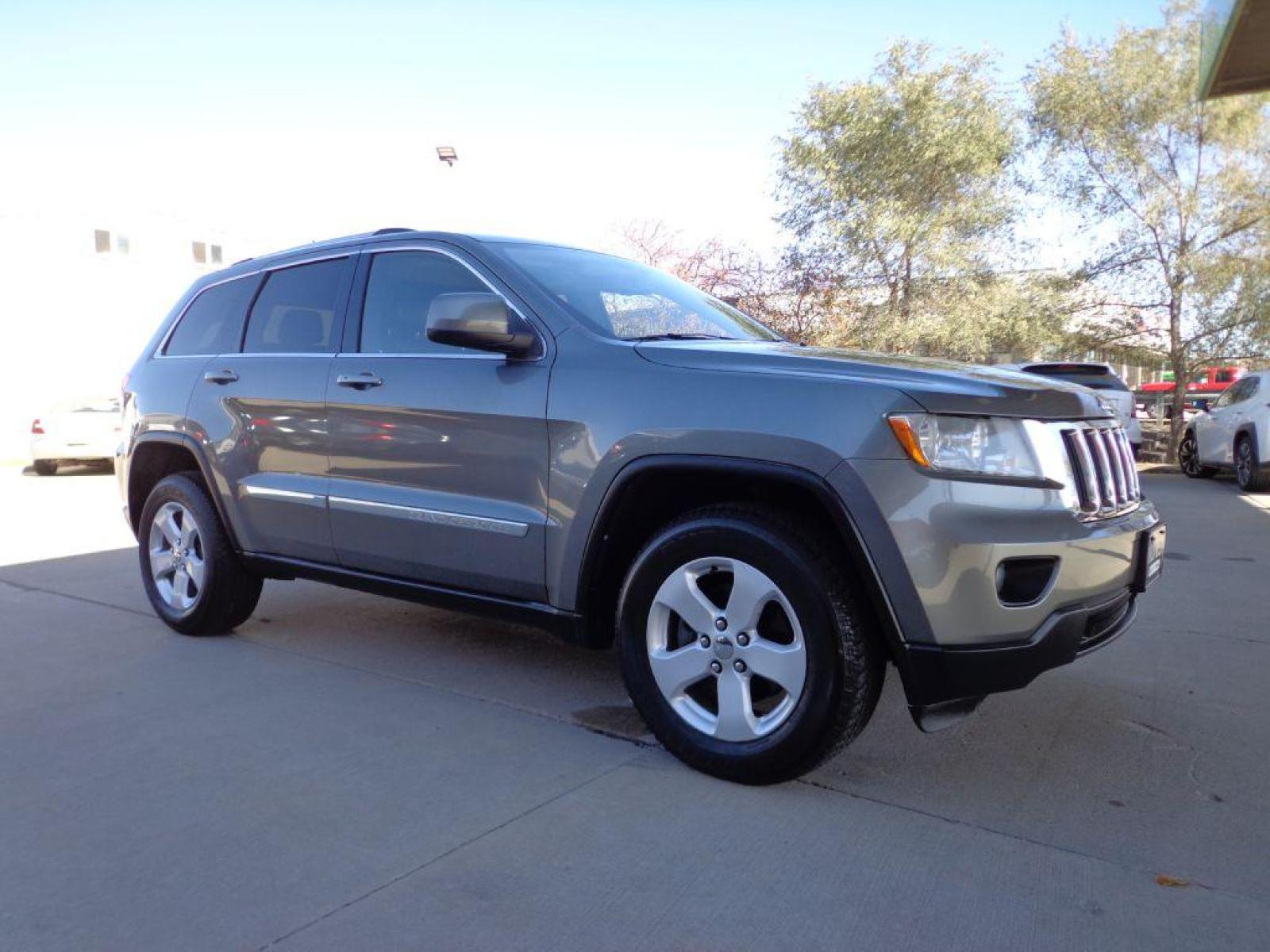 2012 GRAY JEEP GRAND CHEROKEE LAREDO (1C4RJFAG7CC) with an 3.6L engine, Automatic transmission, located at 6610 L St., Omaha, NE, 68117, (402) 731-7800, 41.212872, -96.014702 - 2-OWNER CLEAN CARFAX LOW MILEAGE LOADED WITH HEATED LEATHER, SUNROOF, NAV AND BACKUP CAM! *****We have found that most customers do the majority of their shopping online before visiting a dealership. For this reason we feel it necessary to have a competitive price on our used vehicles right up - Photo #2