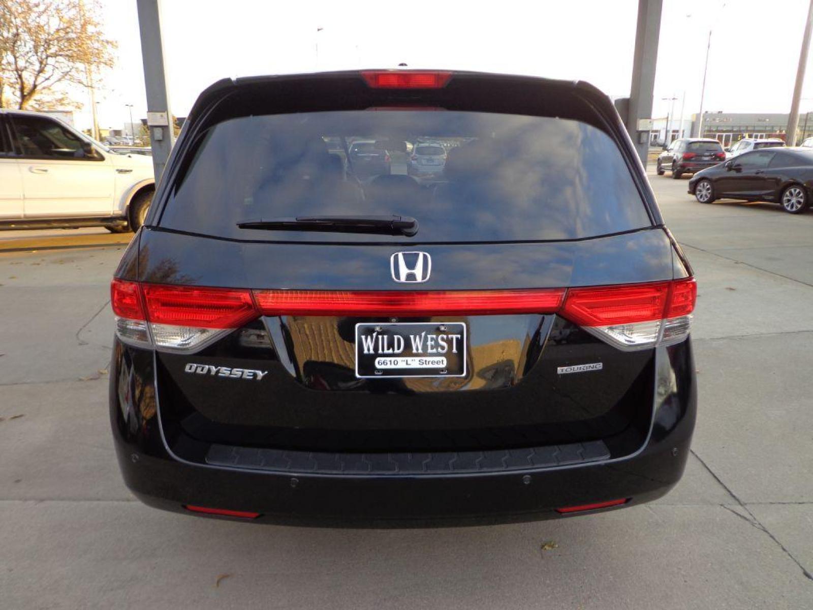 2014 BLACK HONDA ODYSSEY TOURING (5FNRL5H90EB) with an 3.5L engine, Automatic transmission, located at 6610 L St., Omaha, NE, 68117, (402) 731-7800, 41.212872, -96.014702 - 2-OWNER CLEAN CARFAX LOW MILEAGE LOADED WITH OPTIONS AND NEWER TIRES! *****We have found that most customers do the majority of their shopping online before visiting a dealership. For this reason we feel it necessary to have a competitive price on our used vehicles right up front. We spend time - Photo #3