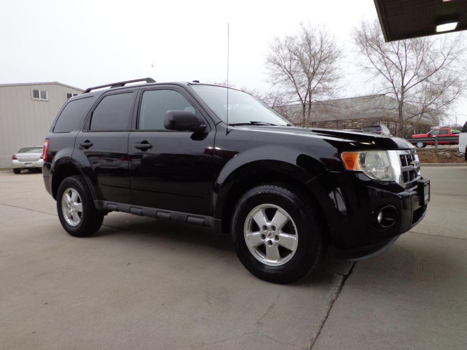 2009 BLACK FORD ESCAPE XLT (1FMCU93G29K) with an 3.0L engine, Automatic transmission, located at 6610 L St., Omaha, NE, 68117, (402) 731-7800, 41.212872, -96.014702 - FRESH TRADE-IN PRE-INSPECTED RUNS AND DRIVES GREAT! *****We have found that most customers do the majority of their shopping online before visiting a dealership. For this reason we feel it necessary to have a competitive price on our used vehicles right up front. We spend time researching the r - Photo #2