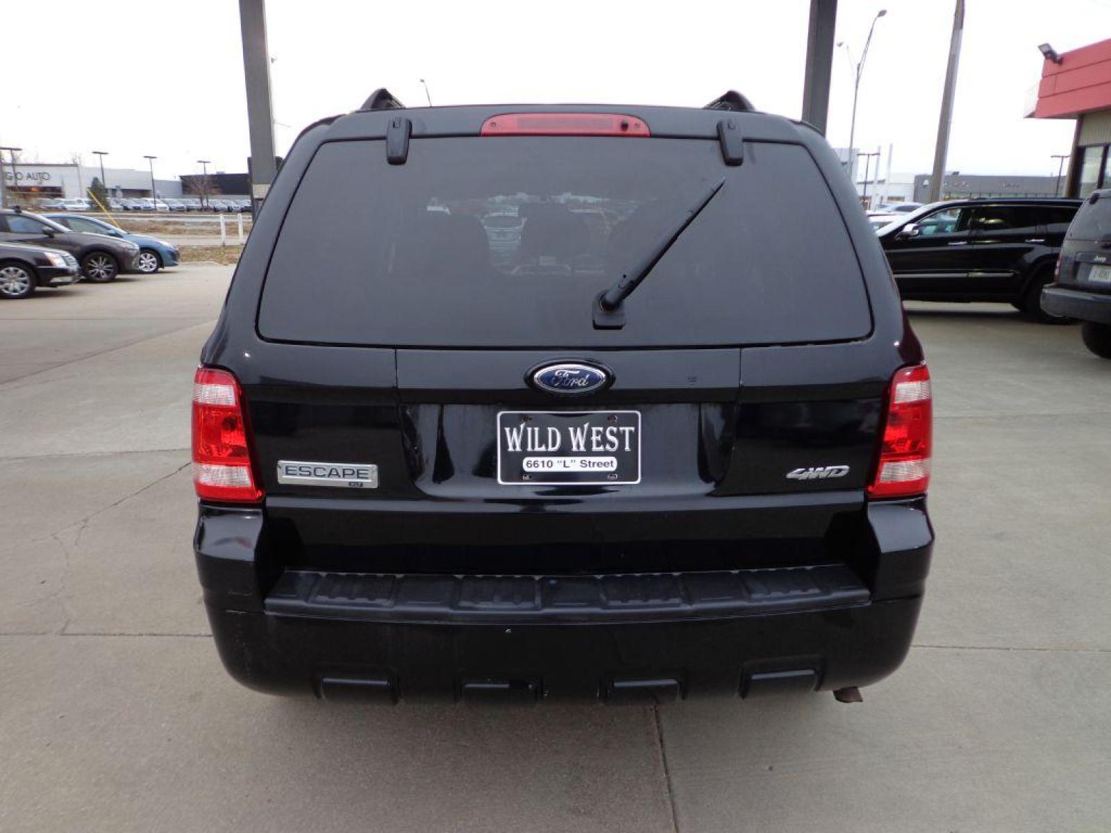 2009 BLACK FORD ESCAPE XLT (1FMCU93G29K) with an 3.0L engine, Automatic transmission, located at 6610 L St., Omaha, NE, 68117, (402) 731-7800, 41.212872, -96.014702 - FRESH TRADE-IN PRE-INSPECTED RUNS AND DRIVES GREAT! *****We have found that most customers do the majority of their shopping online before visiting a dealership. For this reason we feel it necessary to have a competitive price on our used vehicles right up front. We spend time researching the r - Photo #4