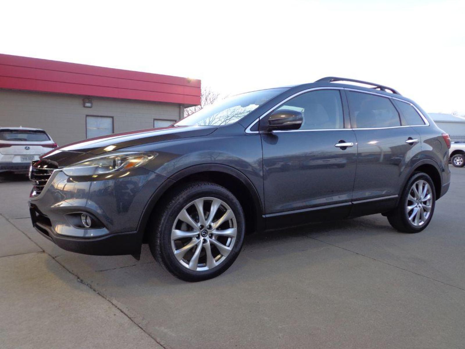 2014 GRAY MAZDA CX-9 GRAND TOURING (JM3TB3DV8E0) with an 3.7L engine, Automatic transmission, located at 6610 L St., Omaha, NE, 68117, (402) 731-7800, 41.212872, -96.014702 - 1-OWNER CLEAN CARFAX LOW MILEAGE LOADED WITH HEATED SEATS, 3RD ROW, SUNROOF, NAV, BACKUP CAM, BOSE AND MUCH MORE! *****We have found that most customers do the majority of their shopping online before visiting a dealership. For this reason we feel it necessary to have a competitive price on o - Photo #0