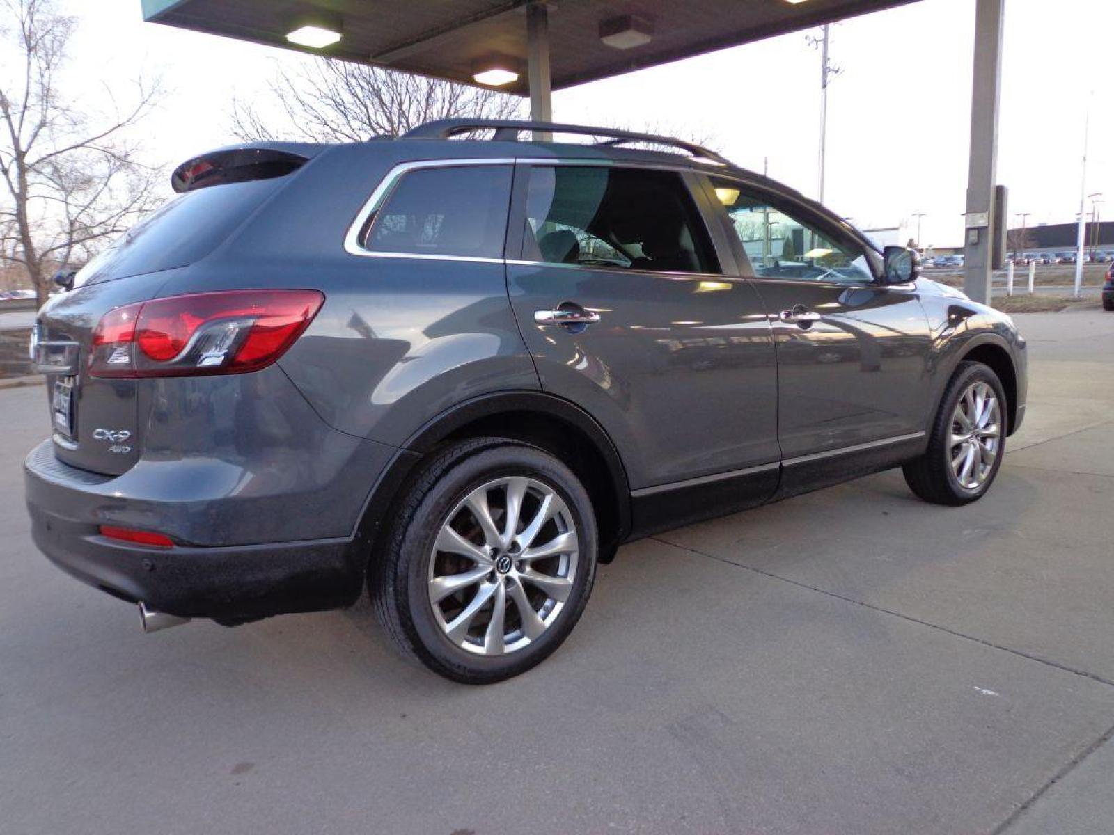 2014 GRAY MAZDA CX-9 GRAND TOURING (JM3TB3DV8E0) with an 3.7L engine, Automatic transmission, located at 6610 L St., Omaha, NE, 68117, (402) 731-7800, 41.212872, -96.014702 - 1-OWNER CLEAN CARFAX LOW MILEAGE LOADED WITH HEATED SEATS, 3RD ROW, SUNROOF, NAV, BACKUP CAM, BOSE AND MUCH MORE! *****We have found that most customers do the majority of their shopping online before visiting a dealership. For this reason we feel it necessary to have a competitive price on o - Photo #3