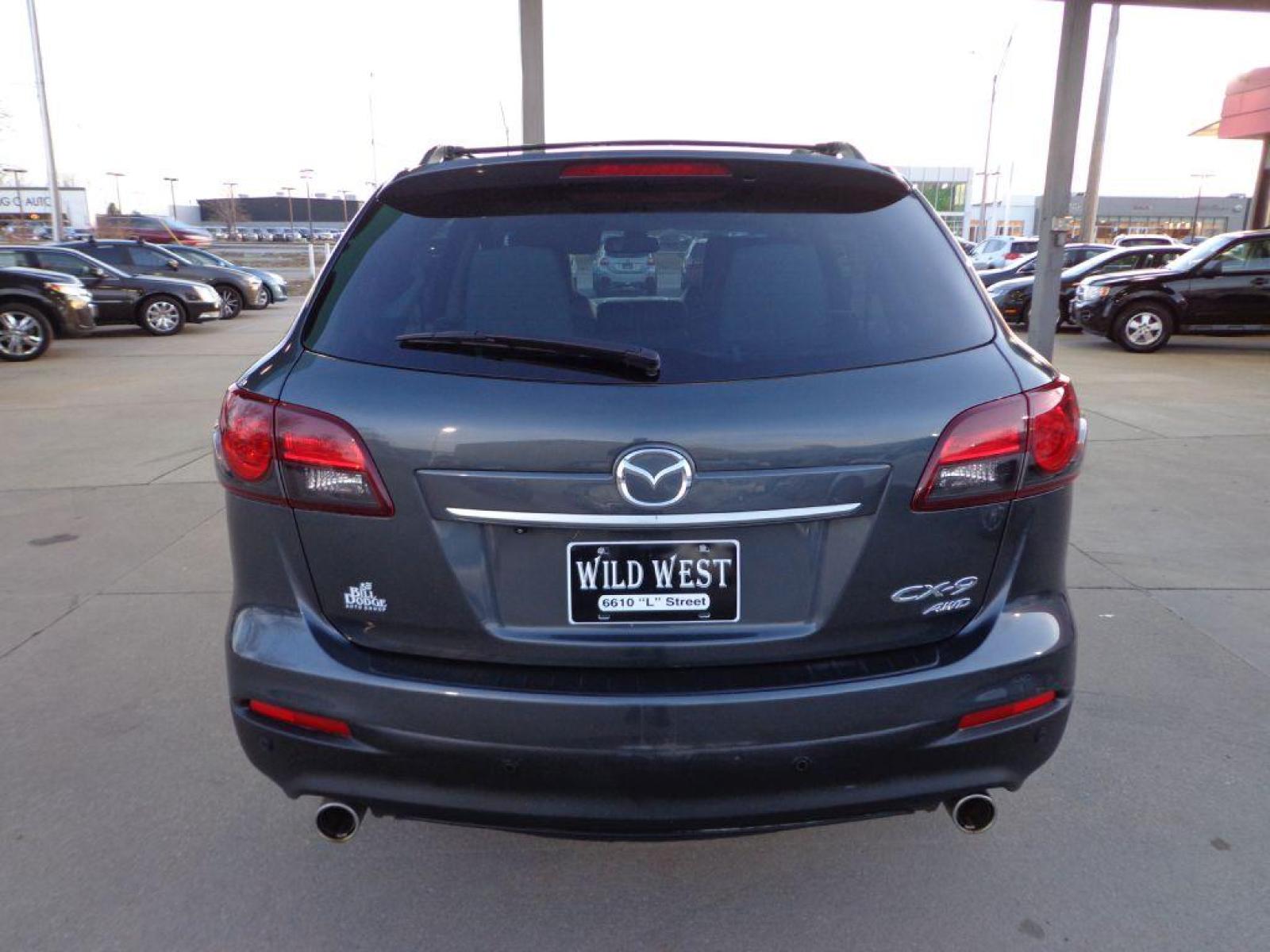 2014 GRAY MAZDA CX-9 GRAND TOURING (JM3TB3DV8E0) with an 3.7L engine, Automatic transmission, located at 6610 L St., Omaha, NE, 68117, (402) 731-7800, 41.212872, -96.014702 - 1-OWNER CLEAN CARFAX LOW MILEAGE LOADED WITH HEATED SEATS, 3RD ROW, SUNROOF, NAV, BACKUP CAM, BOSE AND MUCH MORE! *****We have found that most customers do the majority of their shopping online before visiting a dealership. For this reason we feel it necessary to have a competitive price on o - Photo #4