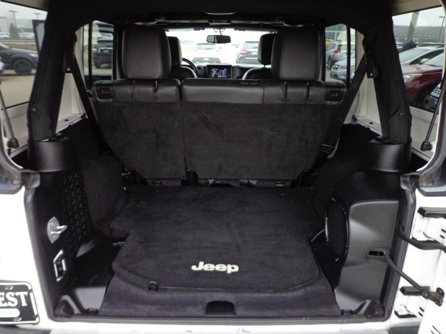 2014 WHITE JEEP WRANGLER UNLIMI SAHARA (1C4HJWEG6EL) with an 3.6L engine, Automatic transmission, located at 6610 L St., Omaha, NE, 68117, (402) 731-7800, 41.212872, -96.014702 - 2-OWNER CLEAN CARFAX LOW MILEAGE WITH HEATED LEATHER, NAV AND NEWER TIRES! *****We have found that most customers do the majority of their shopping online before visiting a dealership. For this reason we feel it necessary to have a competitive price on our used vehicles right up front. We spend - Photo#19