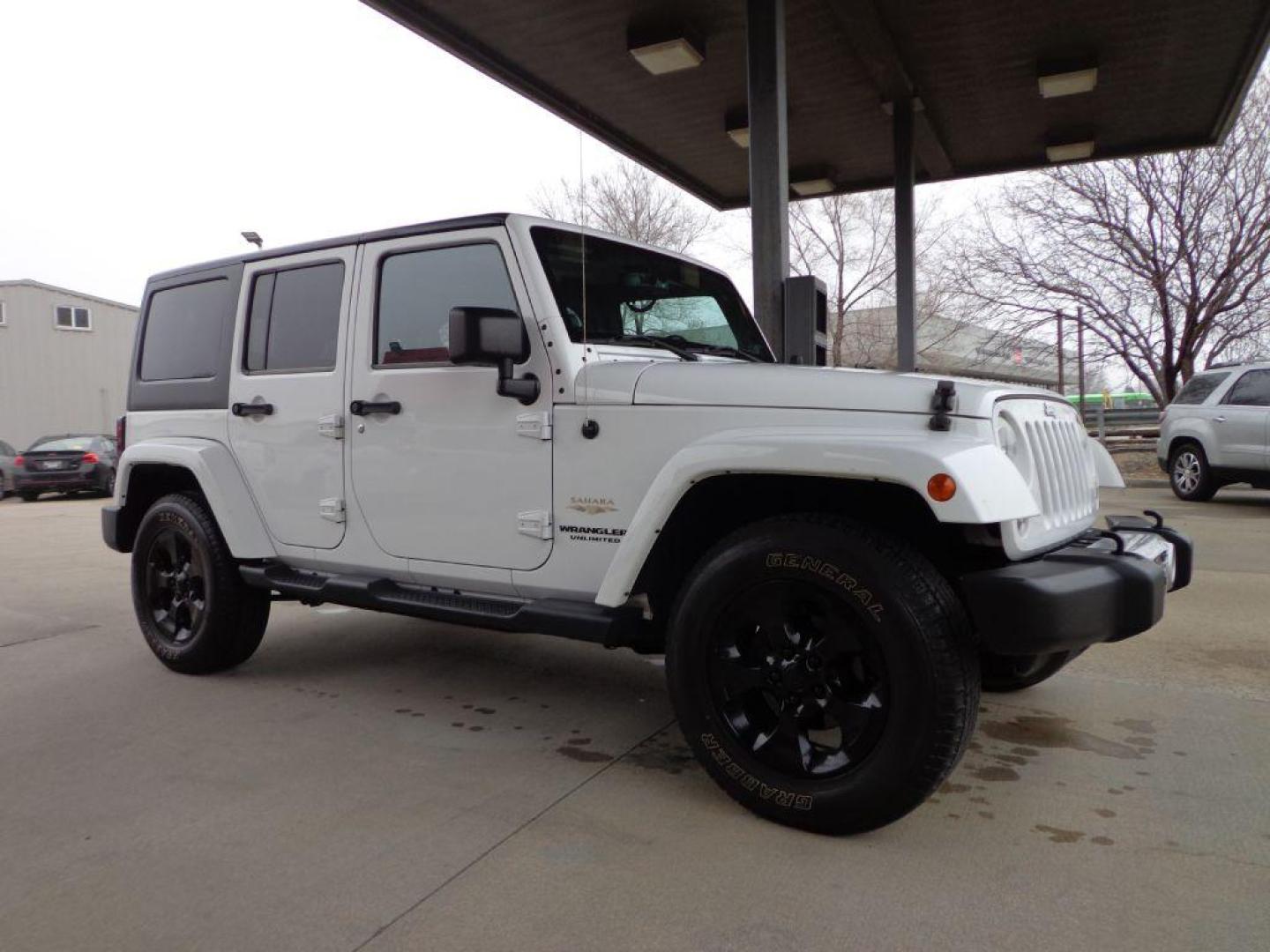 2014 WHITE JEEP WRANGLER UNLIMI SAHARA (1C4HJWEG6EL) with an 3.6L engine, Automatic transmission, located at 6610 L St., Omaha, NE, 68117, (402) 731-7800, 41.212872, -96.014702 - 2-OWNER CLEAN CARFAX LOW MILEAGE WITH HEATED LEATHER, NAV AND NEWER TIRES! *****We have found that most customers do the majority of their shopping online before visiting a dealership. For this reason we feel it necessary to have a competitive price on our used vehicles right up front. We spend - Photo#2