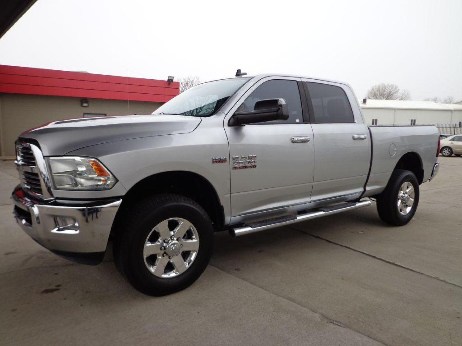 2014 SILVER RAM 2500 BIG HORN (3C6UR5DJXEG) with an 6.4L engine, Automatic transmission, located at 6610 L St., Omaha, NE, 68117, (402) 731-7800, 41.212872, -96.014702 - 1-OWNER, CLEAN CARFAX, LOW MILEAGE, RUST FREE BIG HORN 6.4L! OPTIONS INCLUDE HEATED SEATS, STEERING WHEEL, POWER HEATED T-TOW MIRRORS, U CONNECT MEDIA, REMOTE START AND A NICE SET OF MICHELINS! *****We have found that most customers do the majority of their shopping online before visiting a d - Photo #0