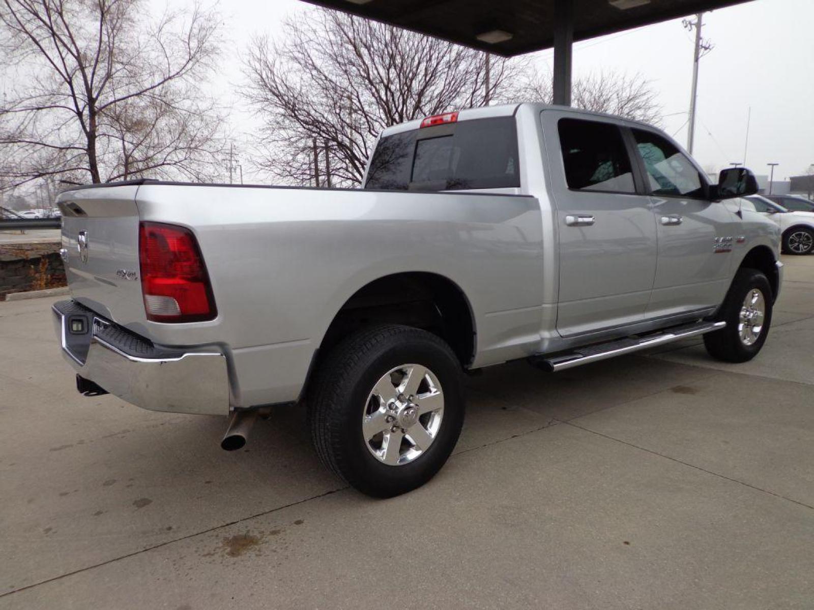 2014 SILVER RAM 2500 BIG HORN (3C6UR5DJXEG) with an 6.4L engine, Automatic transmission, located at 6610 L St., Omaha, NE, 68117, (402) 731-7800, 41.212872, -96.014702 - 1-OWNER, CLEAN CARFAX, LOW MILEAGE, RUST FREE BIG HORN 6.4L! OPTIONS INCLUDE HEATED SEATS, STEERING WHEEL, POWER HEATED T-TOW MIRRORS, U CONNECT MEDIA, REMOTE START AND A NICE SET OF MICHELINS! *****We have found that most customers do the majority of their shopping online before visiting a d - Photo #3