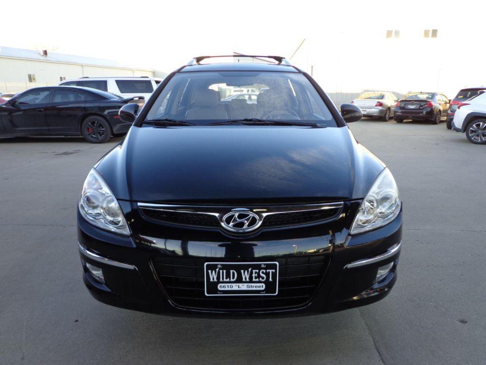 2012 BLACK HYUNDAI ELANTRA TOURING SE (KMHDC8AE5CU) with an 2.0L engine, Automatic transmission, located at 6610 L St., Omaha, NE, 68117, (402) 731-7800, 41.212872, -96.014702 - 1-OWNER CLEAN CARFAX LOW MILEAGE WITH HEATED LEATHER, SUNROOF AND NEWER TIRES! *****We have found that most customers do the majority of their shopping online before visiting a dealership. For this reason we feel it necessary to have a competitive price on our used vehicles right up front. We s - Photo #1