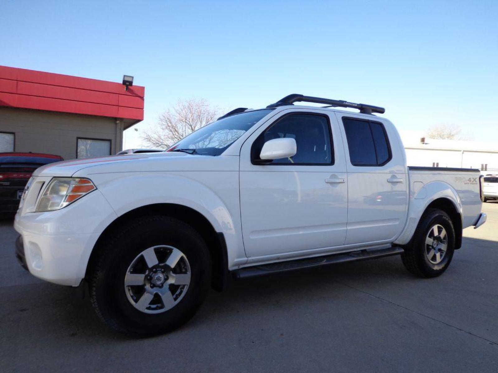 2011 WHITE NISSAN FRONTIER PRO-4X (1N6AD0EV9BC) with an 4.0L engine, Automatic transmission, located at 6610 L St., Omaha, NE, 68117, (402) 731-7800, 41.212872, -96.014702 - SHARP RUST FREE LOW MILEAGE PRO-4X LOADED WITH HEATED LEATHER, SUNROOF, ROCKFORD AUDIO AND NEW TIRES! *****We have found that most customers do the majority of their shopping online before visiting a dealership. For this reason we feel it necessary to have a competitive price on our used vehi - Photo #0