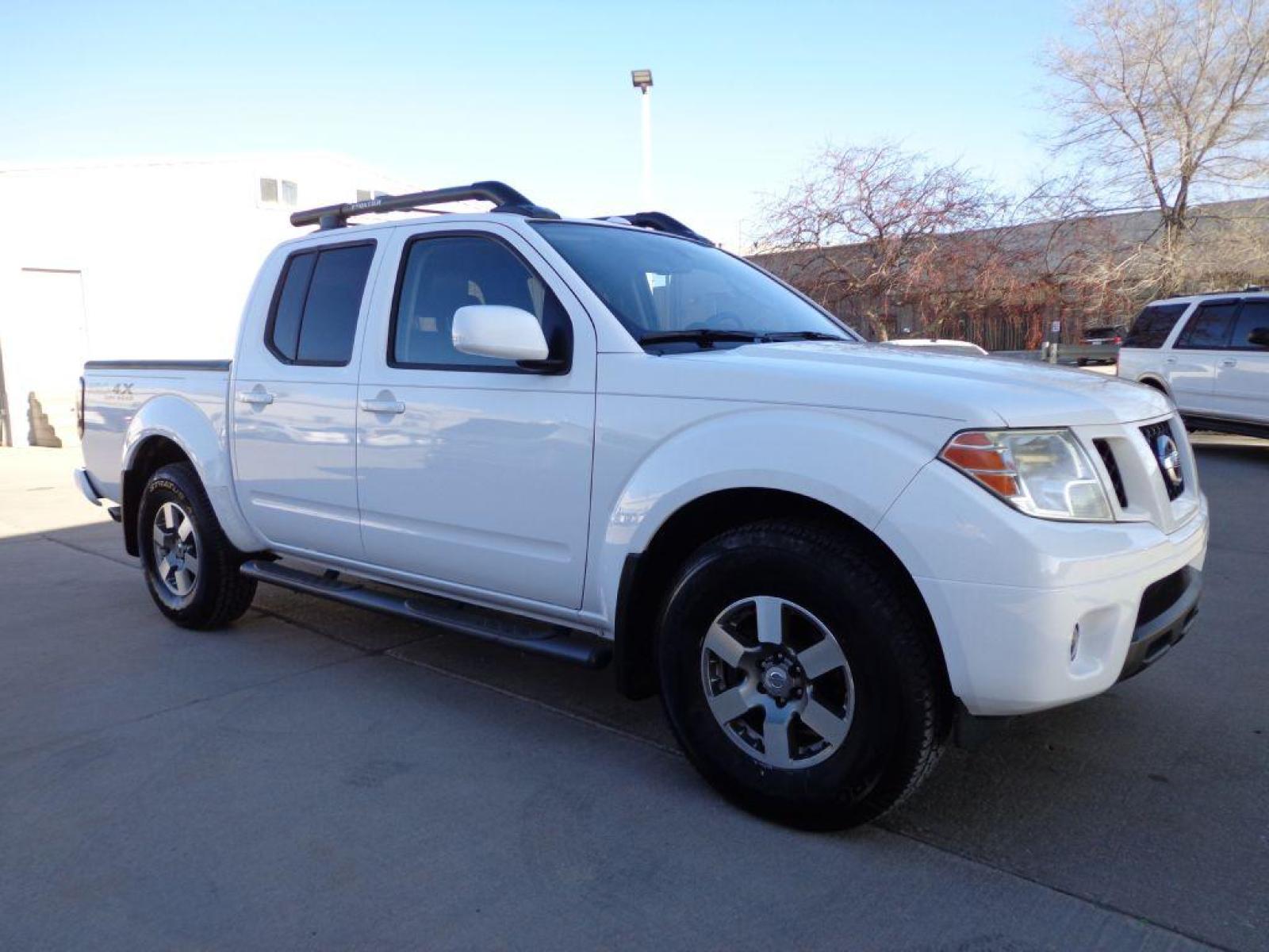 2011 WHITE NISSAN FRONTIER PRO-4X (1N6AD0EV9BC) with an 4.0L engine, Automatic transmission, located at 6610 L St., Omaha, NE, 68117, (402) 731-7800, 41.212872, -96.014702 - SHARP RUST FREE LOW MILEAGE PRO-4X LOADED WITH HEATED LEATHER, SUNROOF, ROCKFORD AUDIO AND NEW TIRES! *****We have found that most customers do the majority of their shopping online before visiting a dealership. For this reason we feel it necessary to have a competitive price on our used vehi - Photo #2