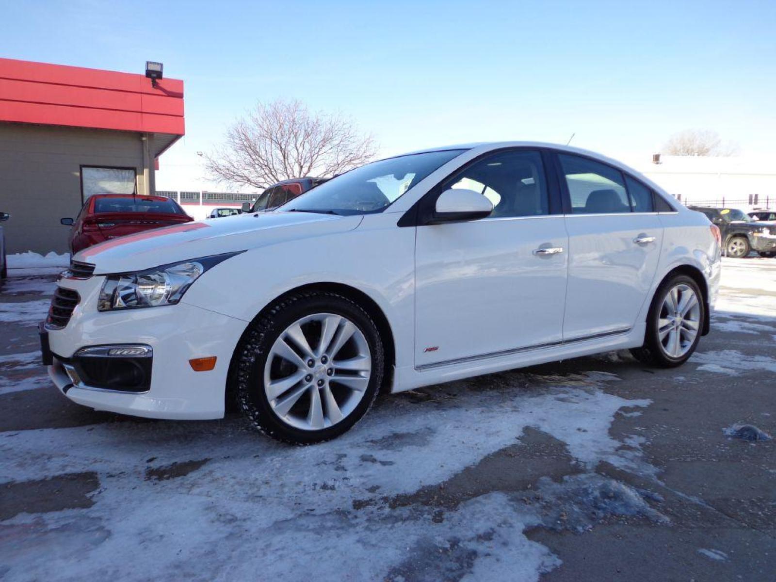 2016 WHITE CHEVROLET CRUZE LIMITED LTZ (1G1PG5SB9G7) with an 1.4L engine, Automatic transmission, located at 6610 L St., Omaha, NE, 68117, (402) 731-7800, 41.212872, -96.014702 - 2-OWNER CLEAN CARFAX LOW MILEAGE RS PACKAGE LOADED WITH HRATED LEATHER, SUNROOF, NAV, BACKUP CAM, PIONEER AUDIO AND NEWER TIRES! *****We have found that most customers do the majority of their shopping online before visiting a dealership. For this reason we feel it necessary to have a competiti - Photo #0