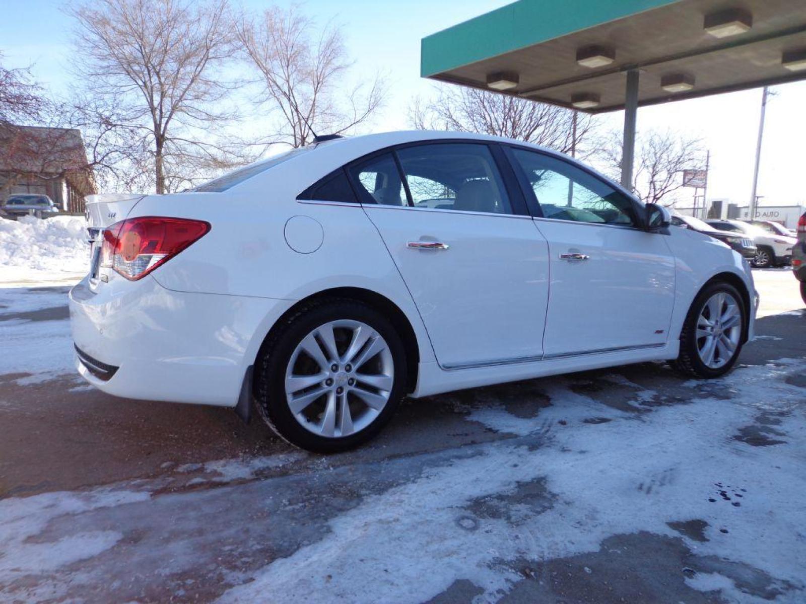 2016 WHITE CHEVROLET CRUZE LIMITED LTZ (1G1PG5SB9G7) with an 1.4L engine, Automatic transmission, located at 6610 L St., Omaha, NE, 68117, (402) 731-7800, 41.212872, -96.014702 - 2-OWNER CLEAN CARFAX LOW MILEAGE RS PACKAGE LOADED WITH HRATED LEATHER, SUNROOF, NAV, BACKUP CAM, PIONEER AUDIO AND NEWER TIRES! *****We have found that most customers do the majority of their shopping online before visiting a dealership. For this reason we feel it necessary to have a competiti - Photo #3