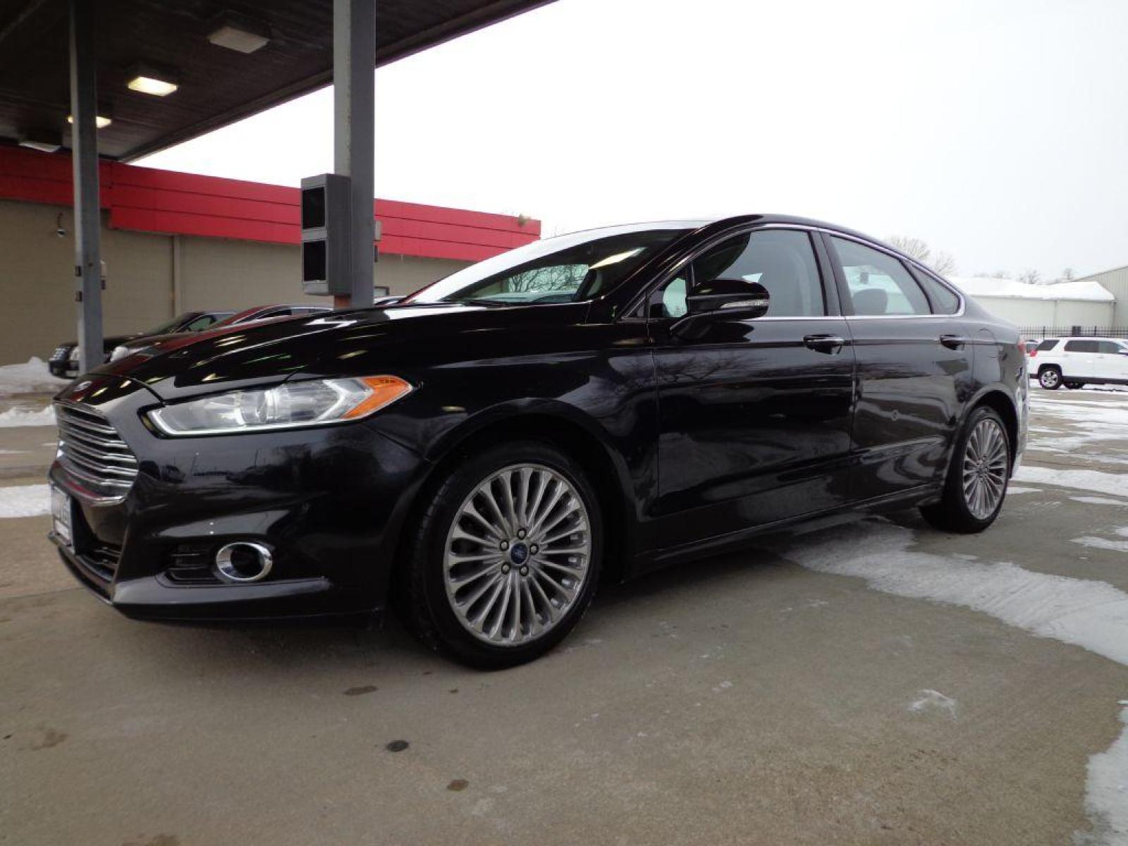 2015 BLACK FORD FUSION TITANIUM (3FA6P0K92FR) with an 2.0L engine, Automatic transmission, located at 6610 L St., Omaha, NE, 68117, (402) 731-7800, 41.212872, -96.014702 - SHARP LOW MILE TITANIUM PACKAGE WITH SUNROOF, DRIVERS ASSIST AND NEWER TIRES! *****We have found that most customers do the majority of their shopping online before visiting a dealership. For this reason we feel it necessary to have a competitive price on our used vehicles right up front. We sp - Photo #0
